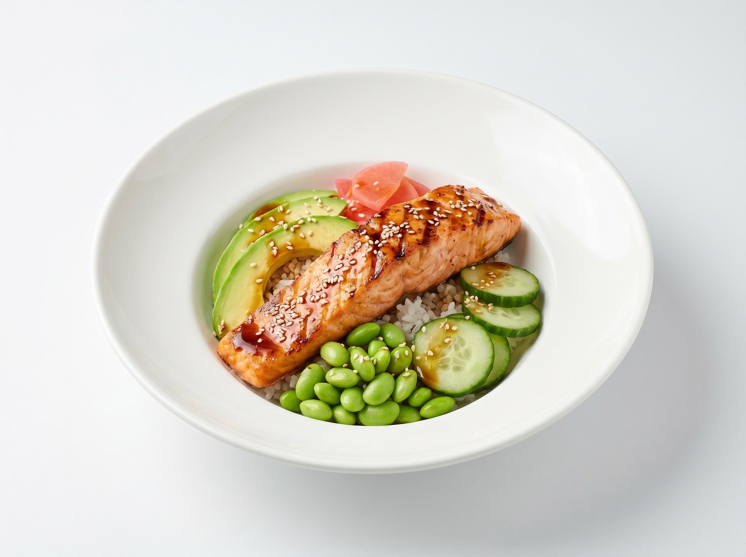 Salmon bowl with avocado, edamame, and cucumber