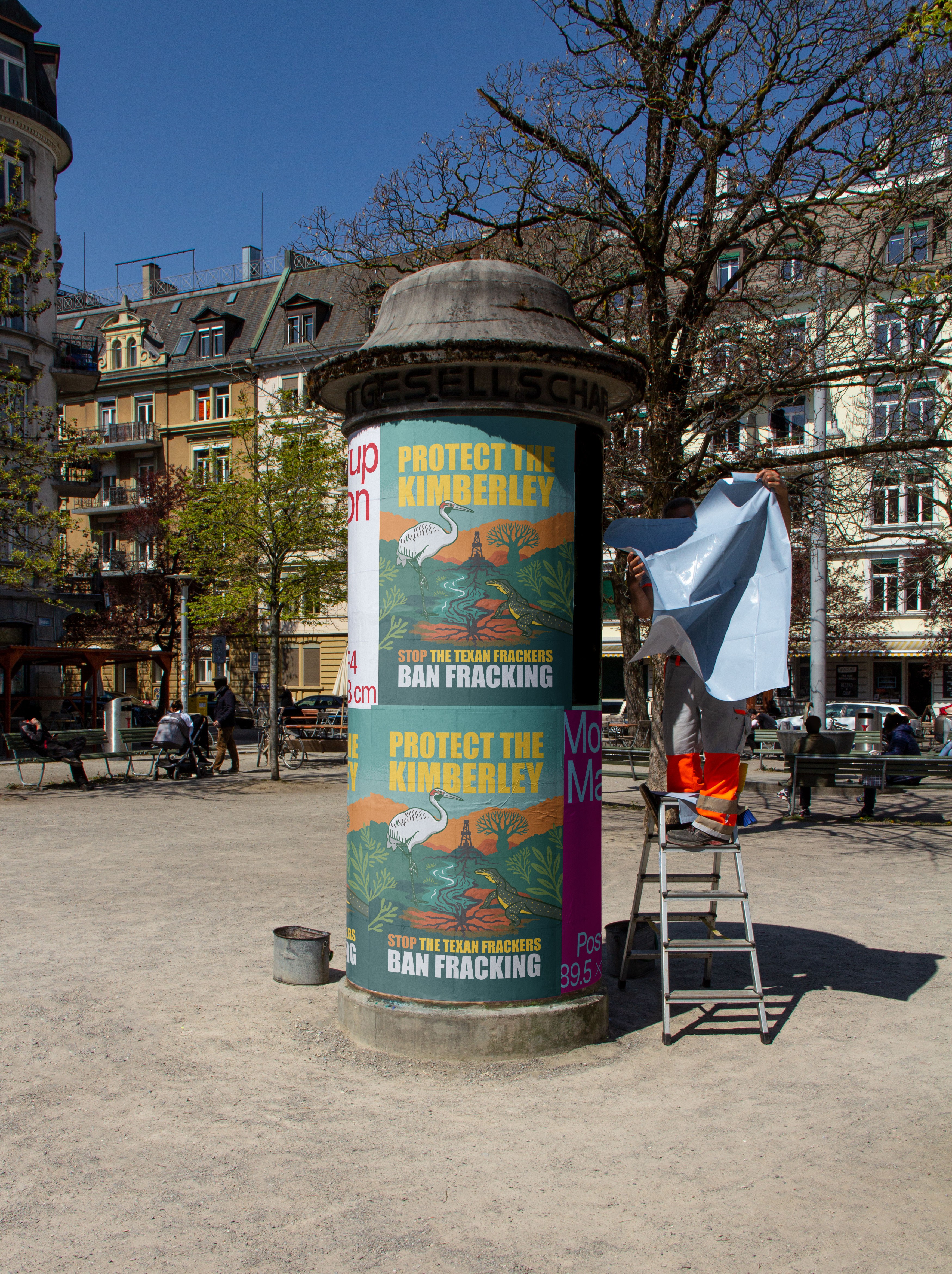 photo of Frack Free Kinberley illustrated and designed posters pasted on sign post
