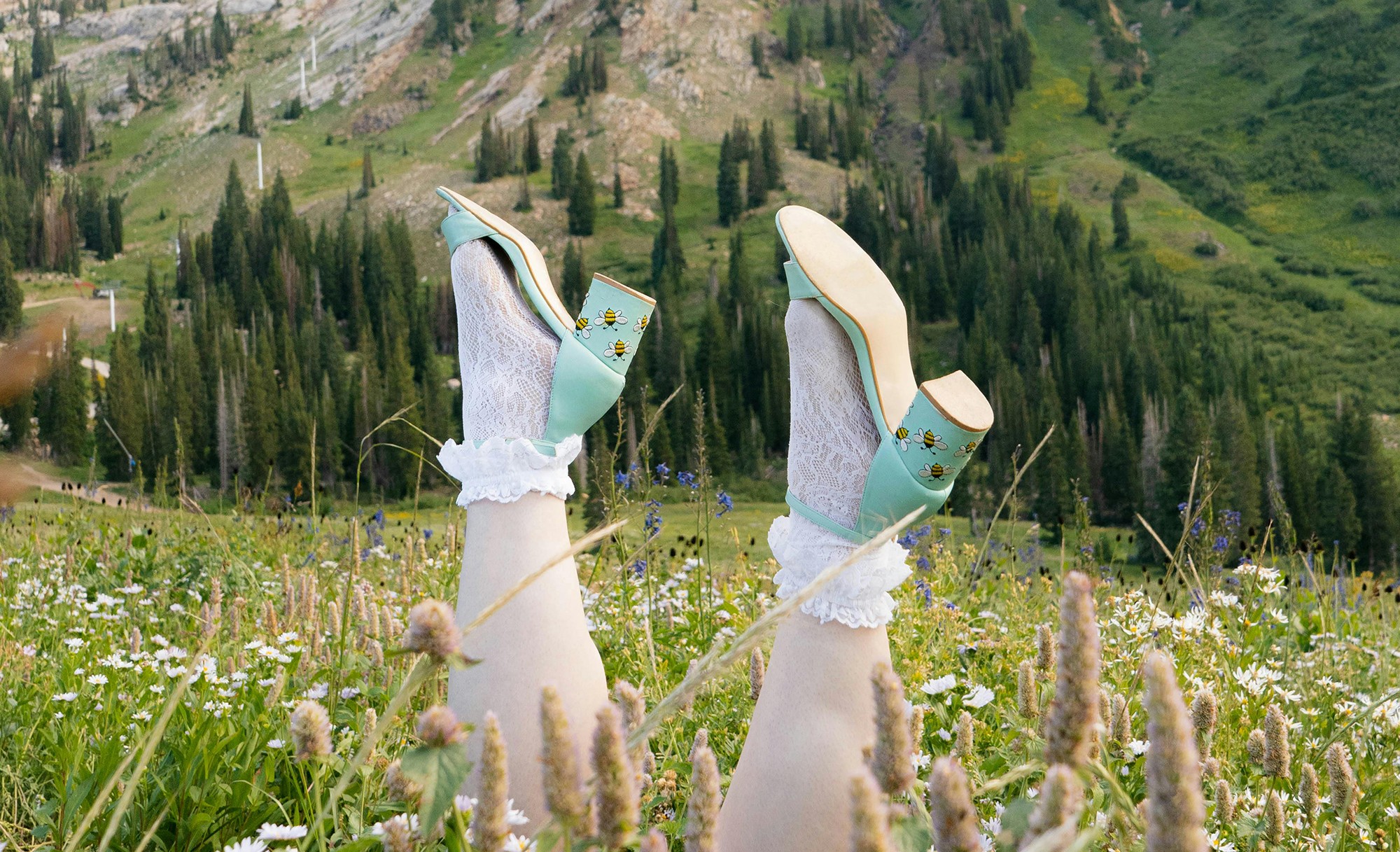 flat lay photography of man and woman holding hands together