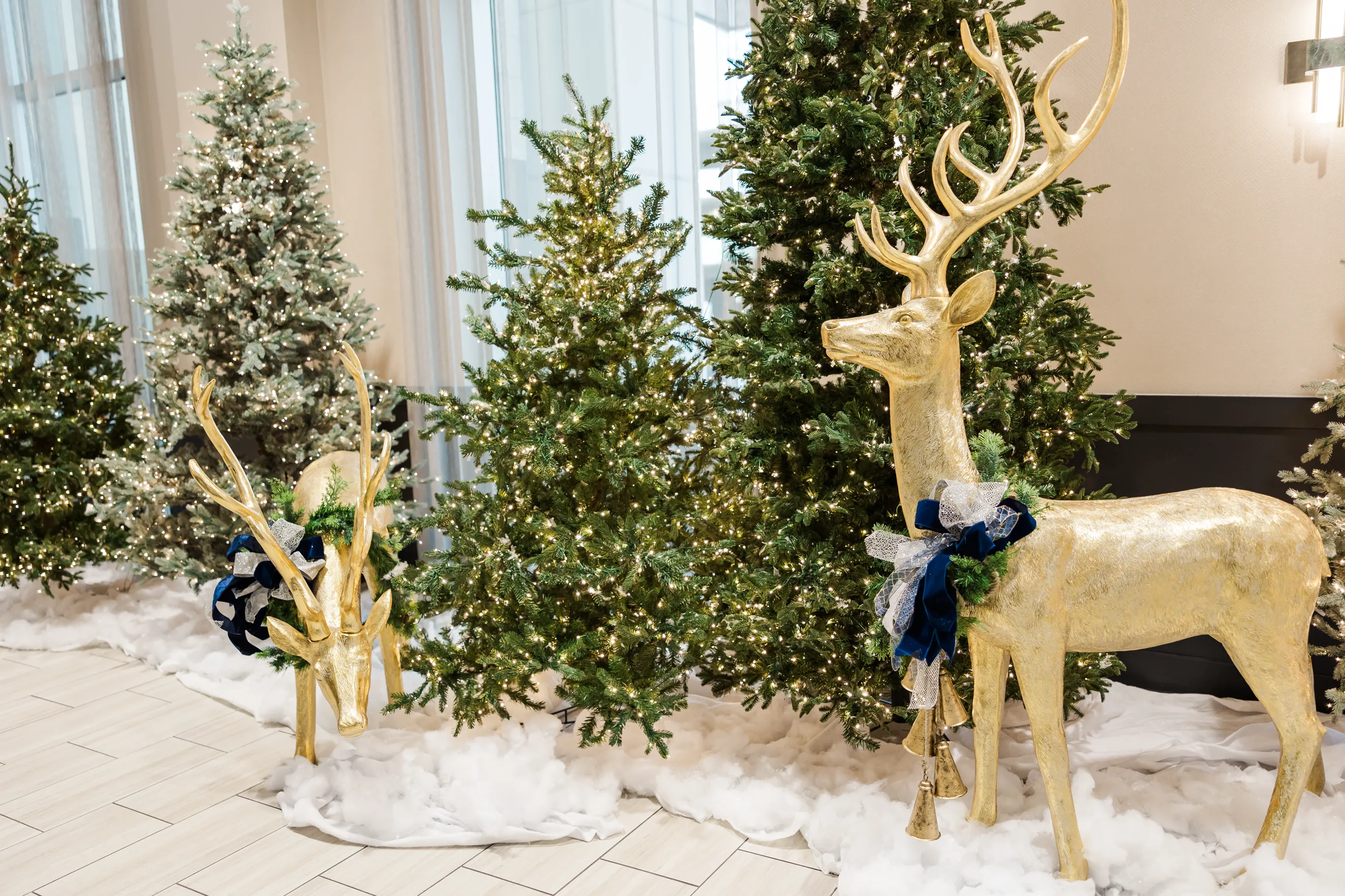 Vibrant tablescape by Sarah Overall Events with pink scalloped napkins, gold flatware, personalized place settings, and colorful floral arrangements in Shreveport.