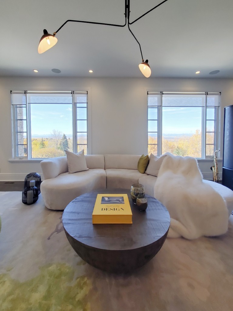 Image of Luxury living room interior design by KHD Homes featuring furniture and layout design elements.