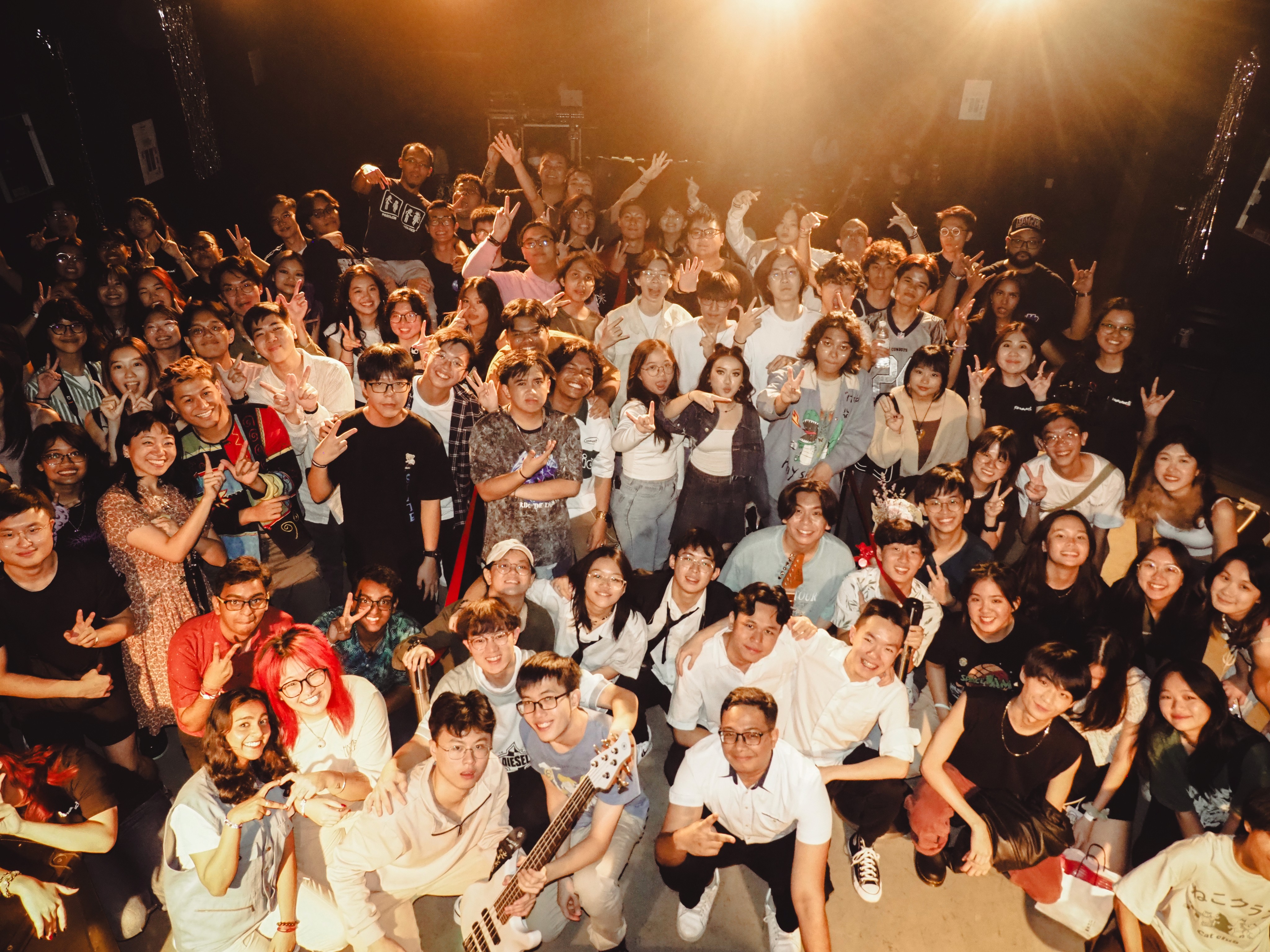 Group photo with all volunteers, attendees, and performers at RE:surgence Vol 1