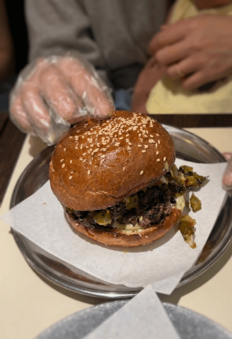 Hand holding a packet of Nutella Biscuits