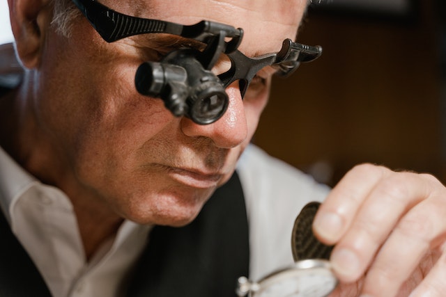 man looking at a watch