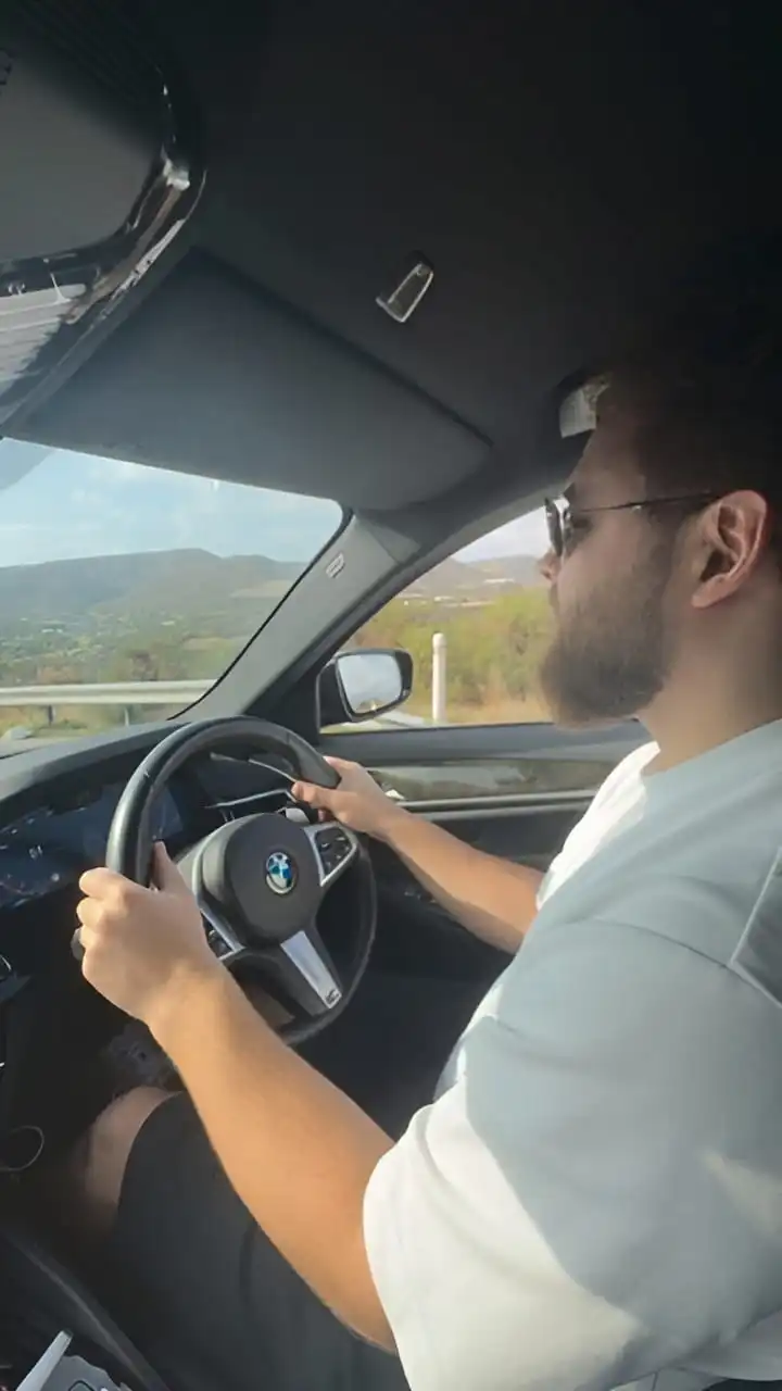 gray mercedes benz coupe on black asphalt road during daytime