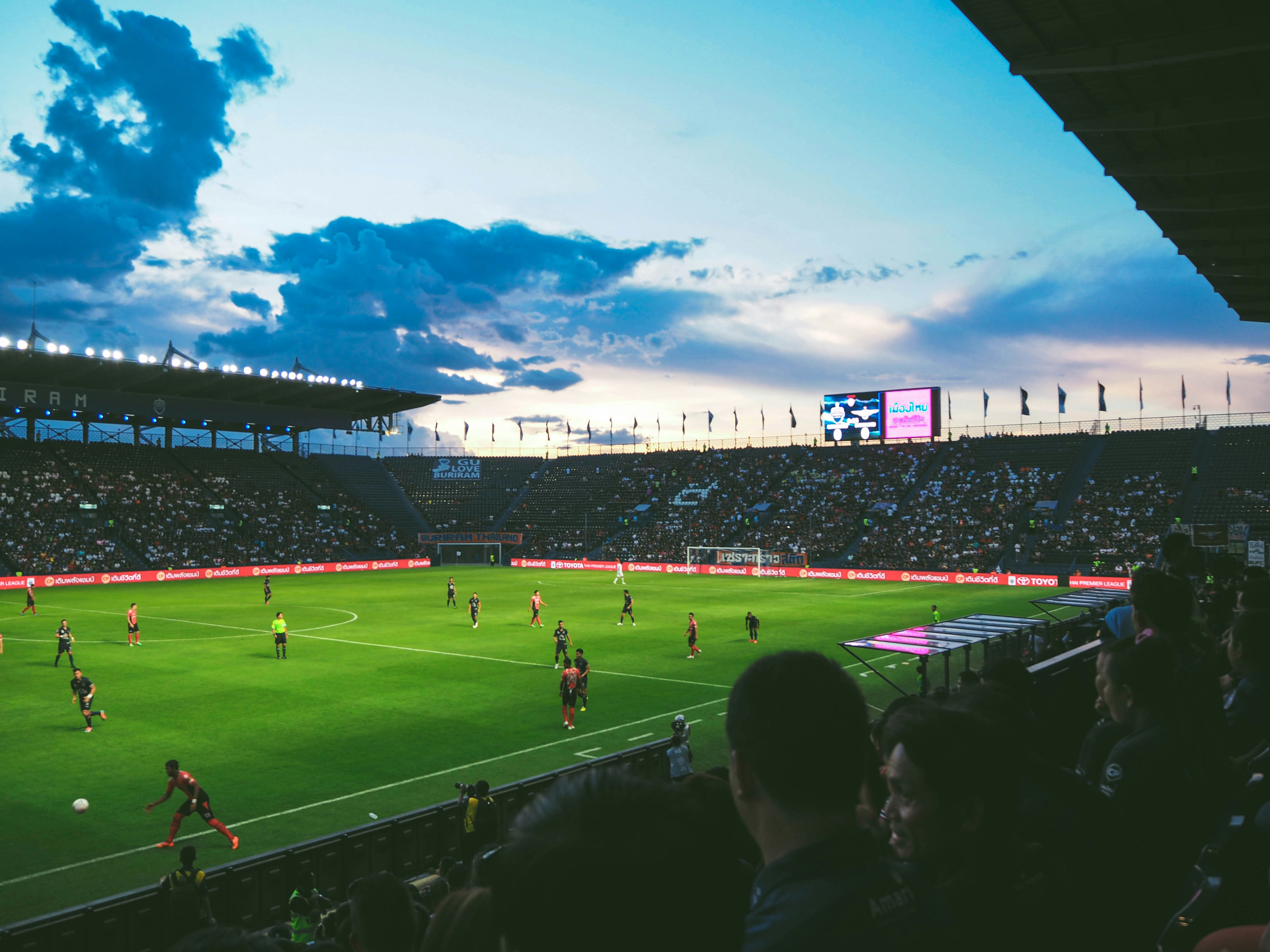 A soccer field filled with people placing valuebets 