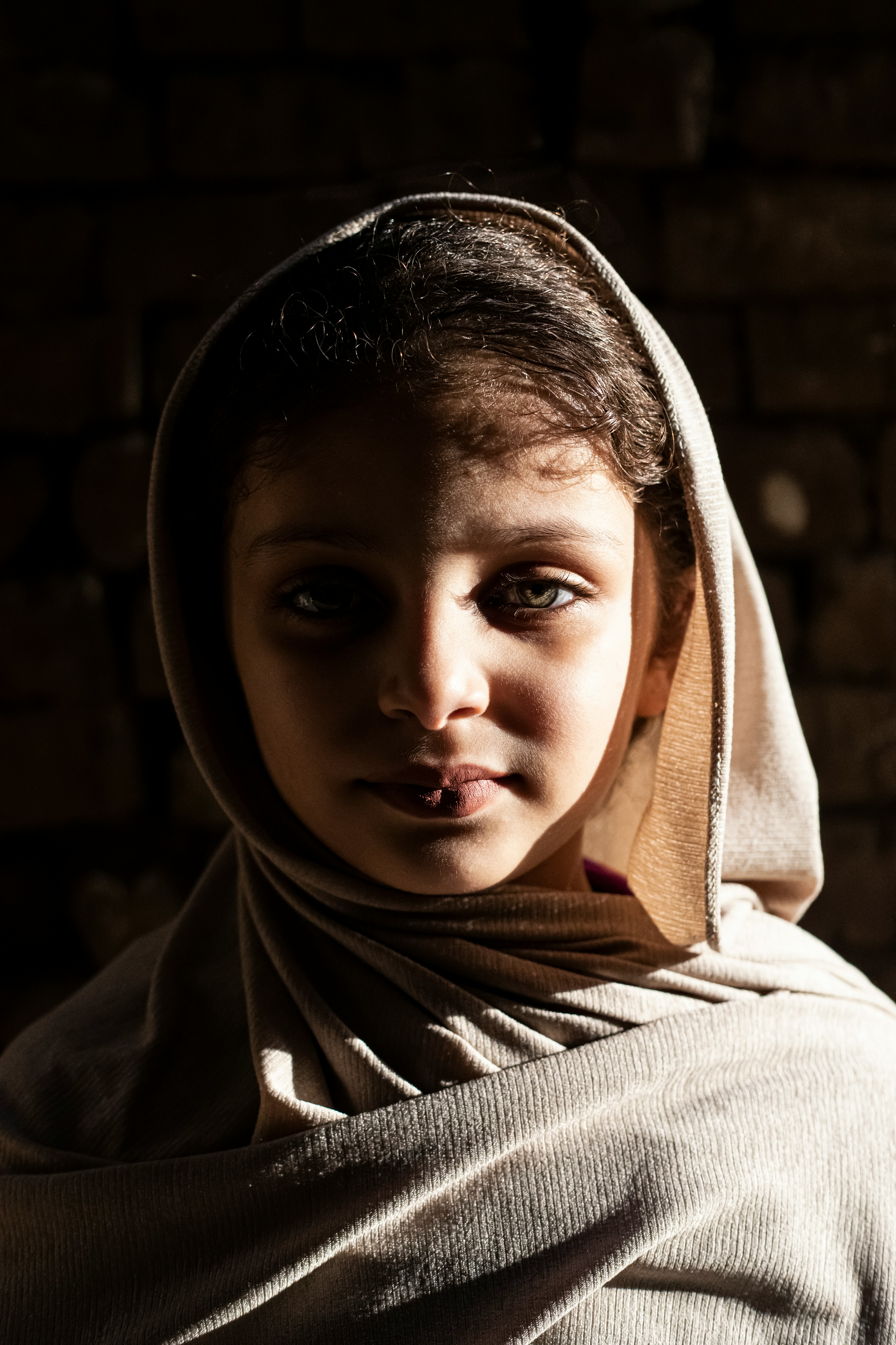 woman in white hijab in grayscale photography