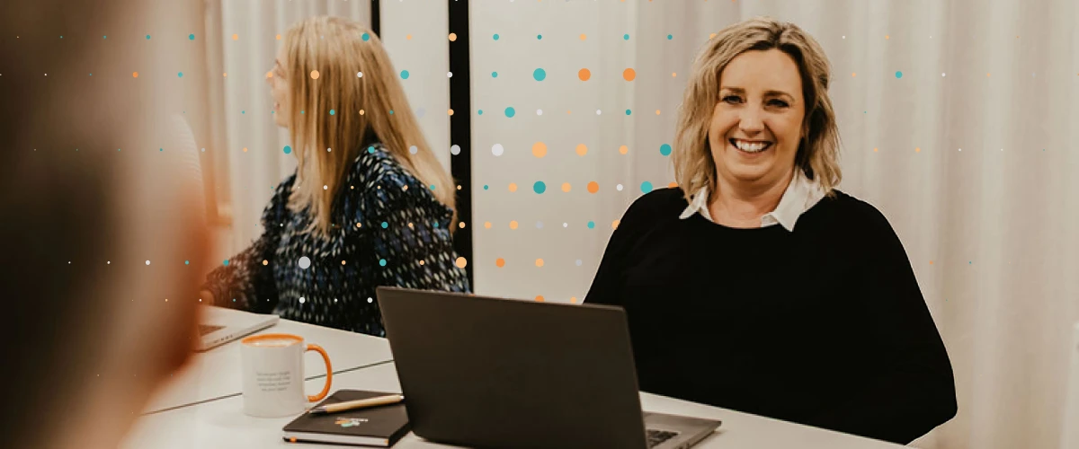 people smiling in a transformation meeting