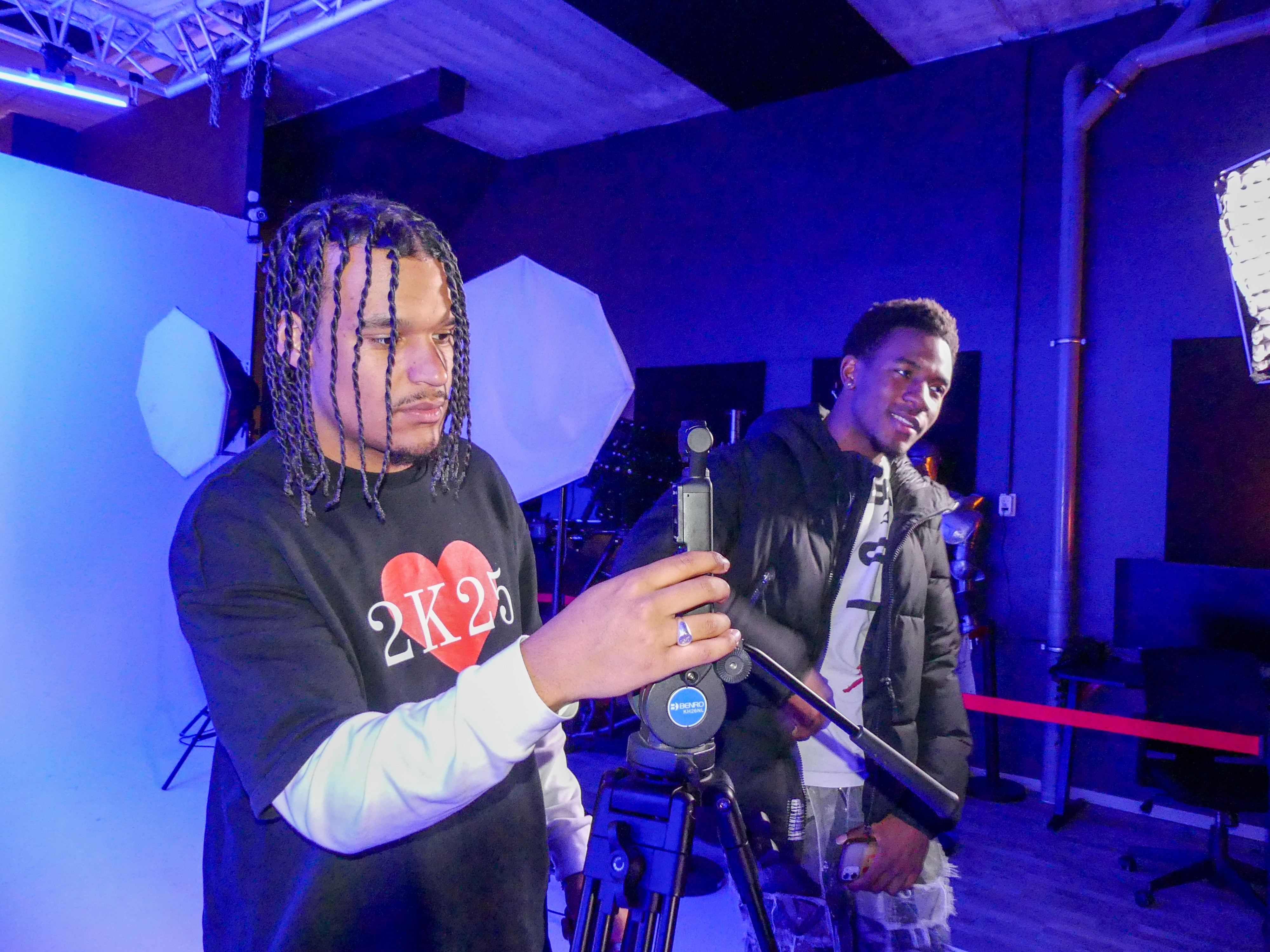 Silhouette of a woman against a dark brown silk background