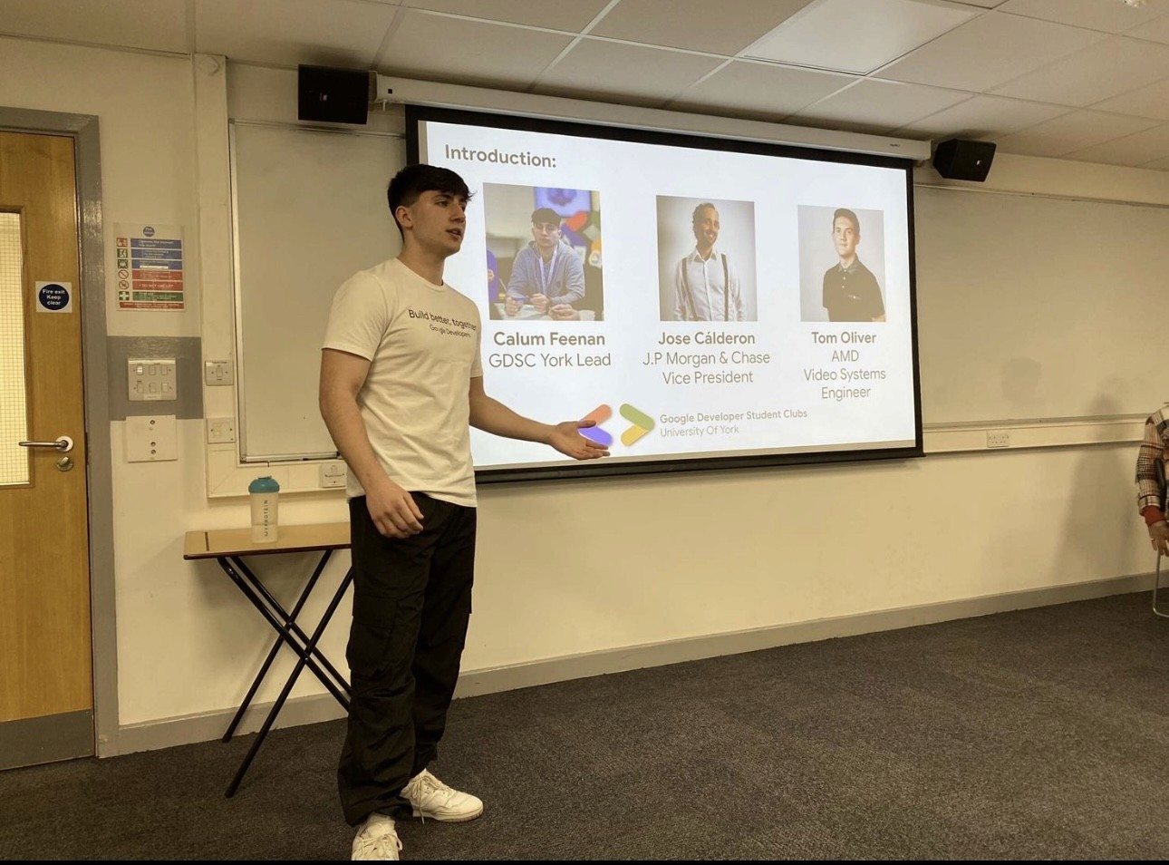 person writing on a piece of paper 