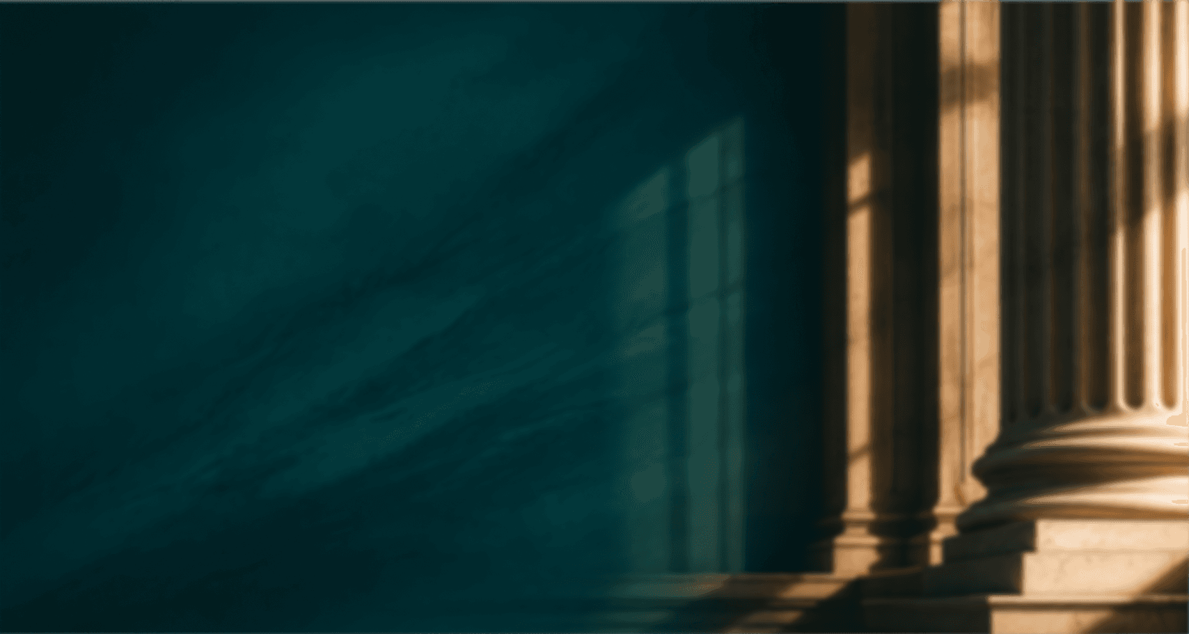 Grand courthouse interior with tall classical columns and dramatic teal-toned lighting, representing law, justice and legal authority