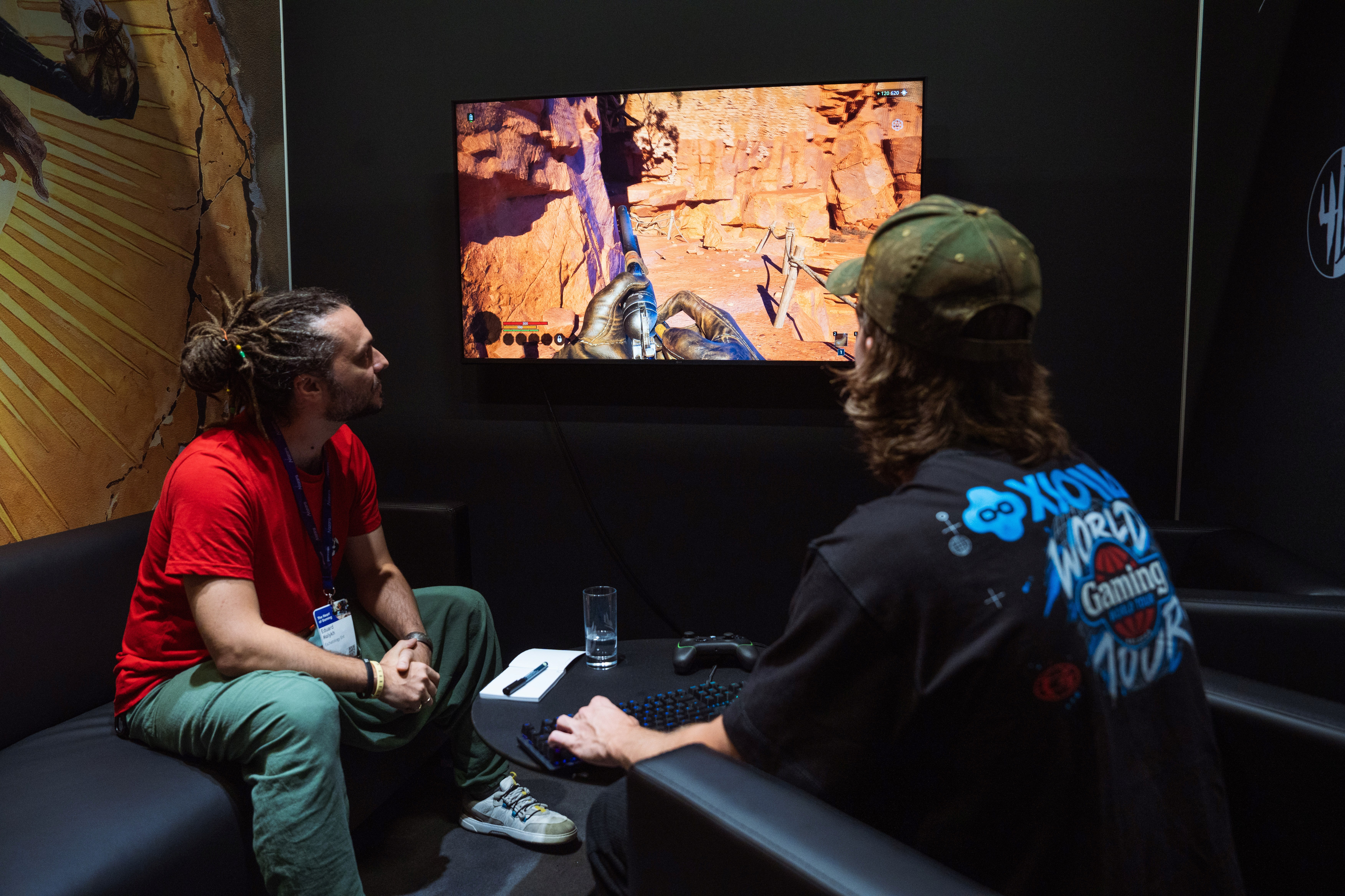 Jake Lucky playing Guns of Eschaton Game demo at Gamescom 2026 with head of game design Eduard Malykh
