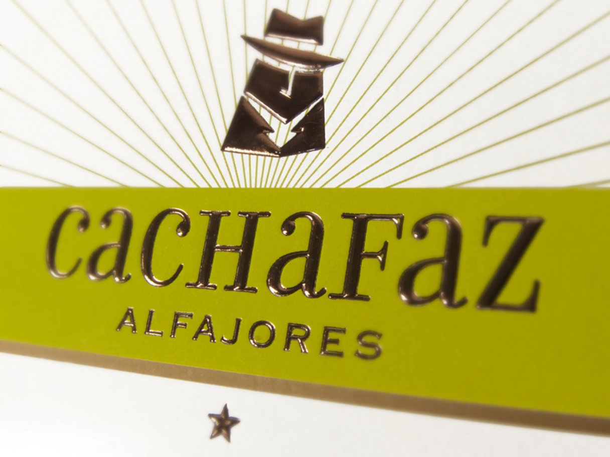 Rustic cabin in a golden field at sunset