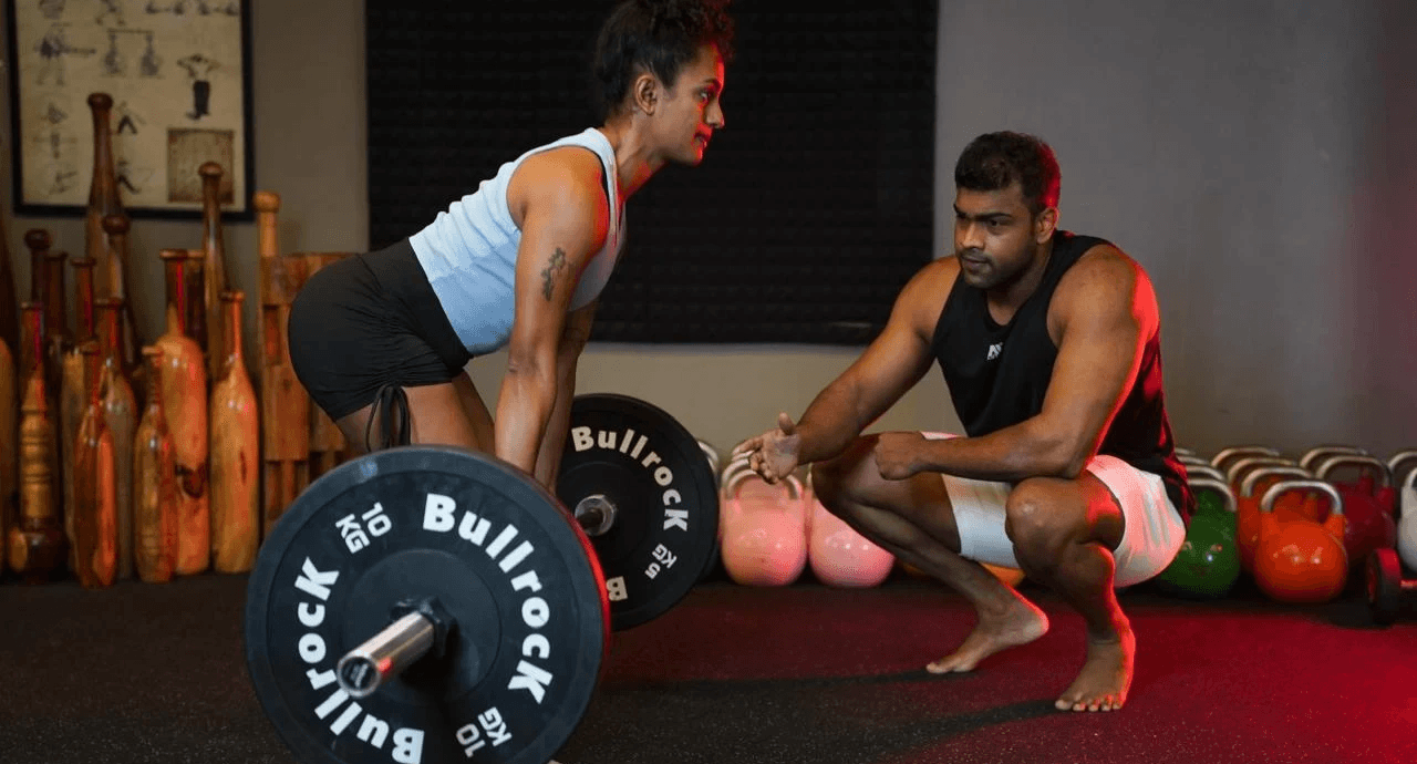 Free weights and power racks at Zero Fitness Trivandrum