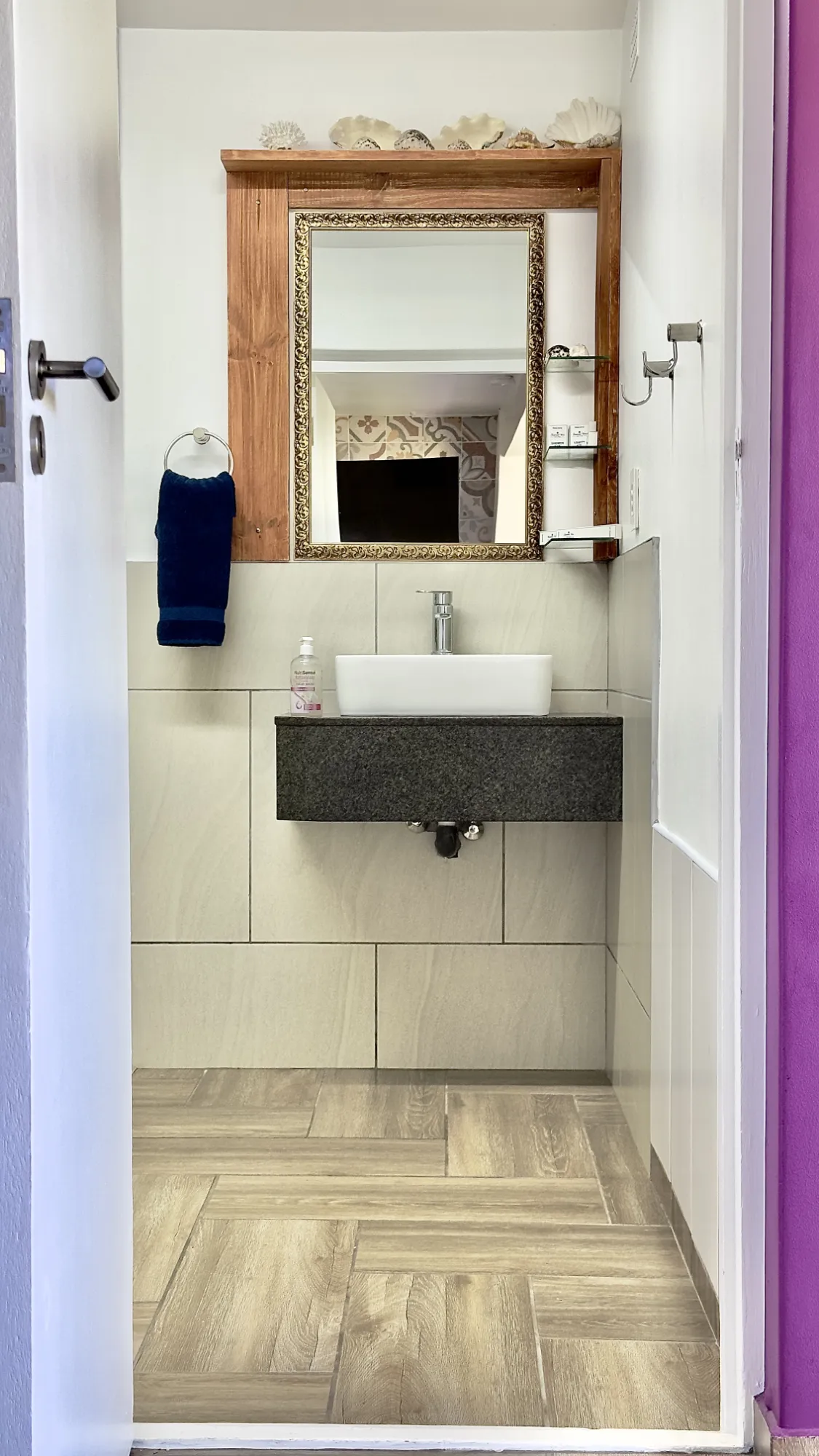 The bathroom basin area in our District 6 room.