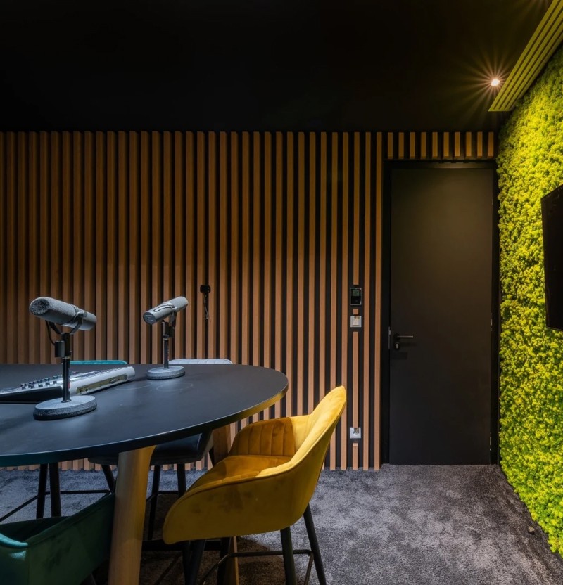 Coference room with a table and microphones