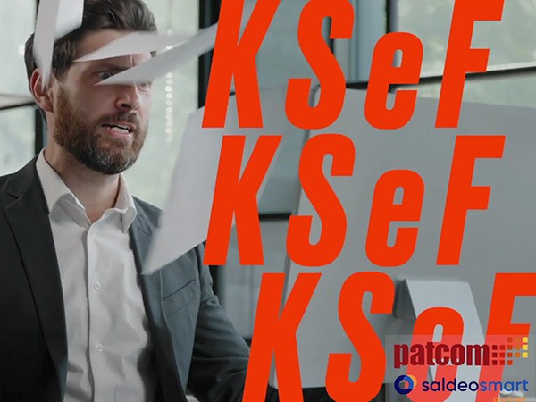 A man in a suit is seated at an office desk with floating papers around him, and the bold red letters "KSeF" overlay the scene prominently.