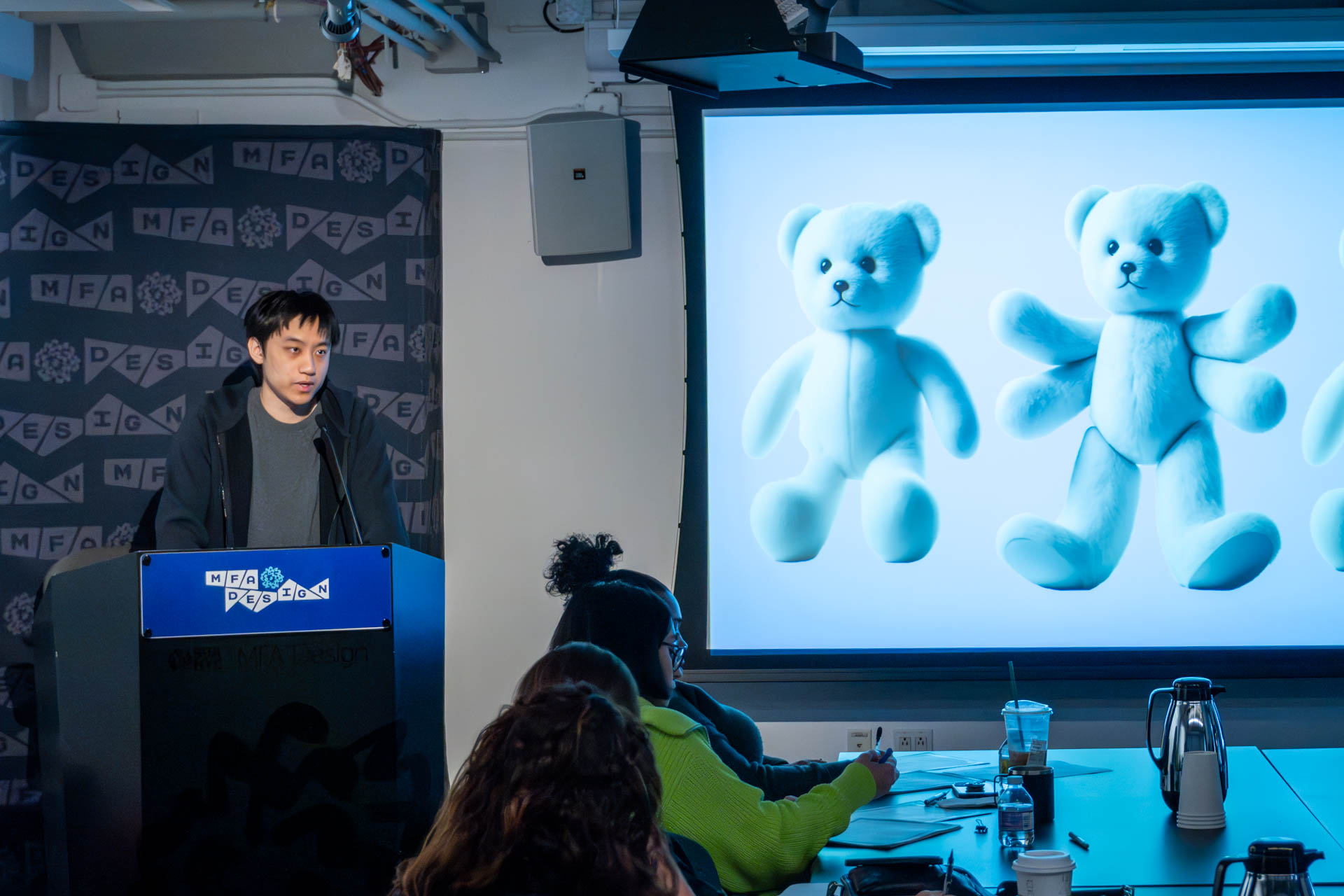 student at a podium giving a presentation