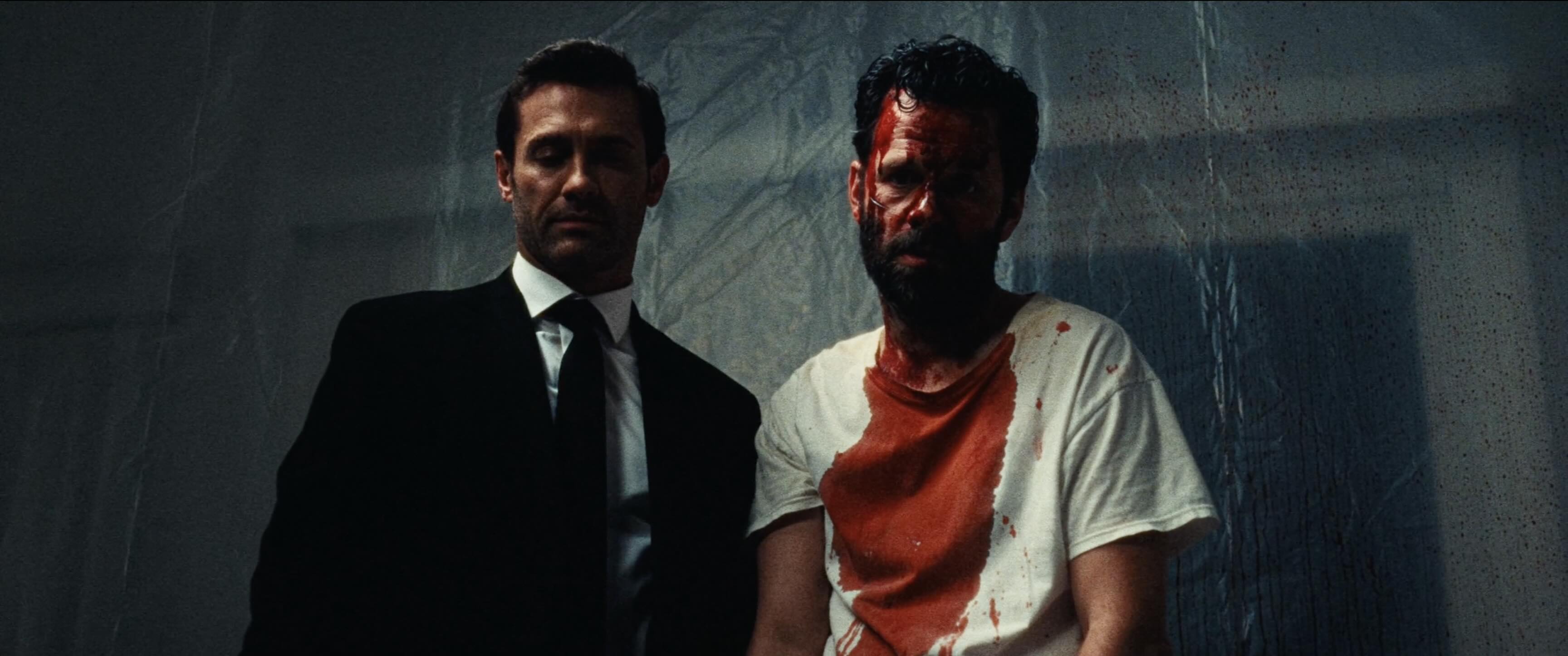 man with gun to head