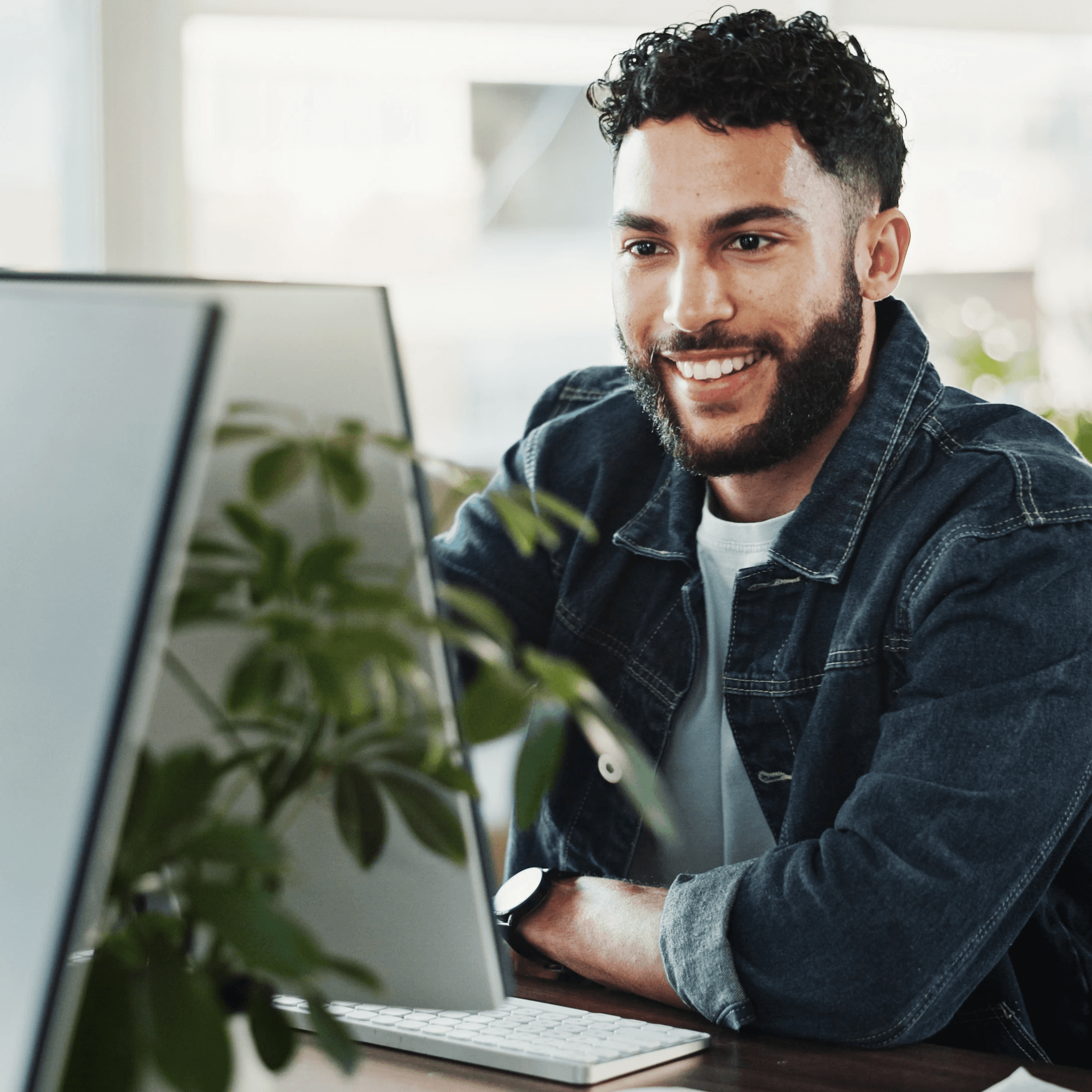 Data analyst working at a desk