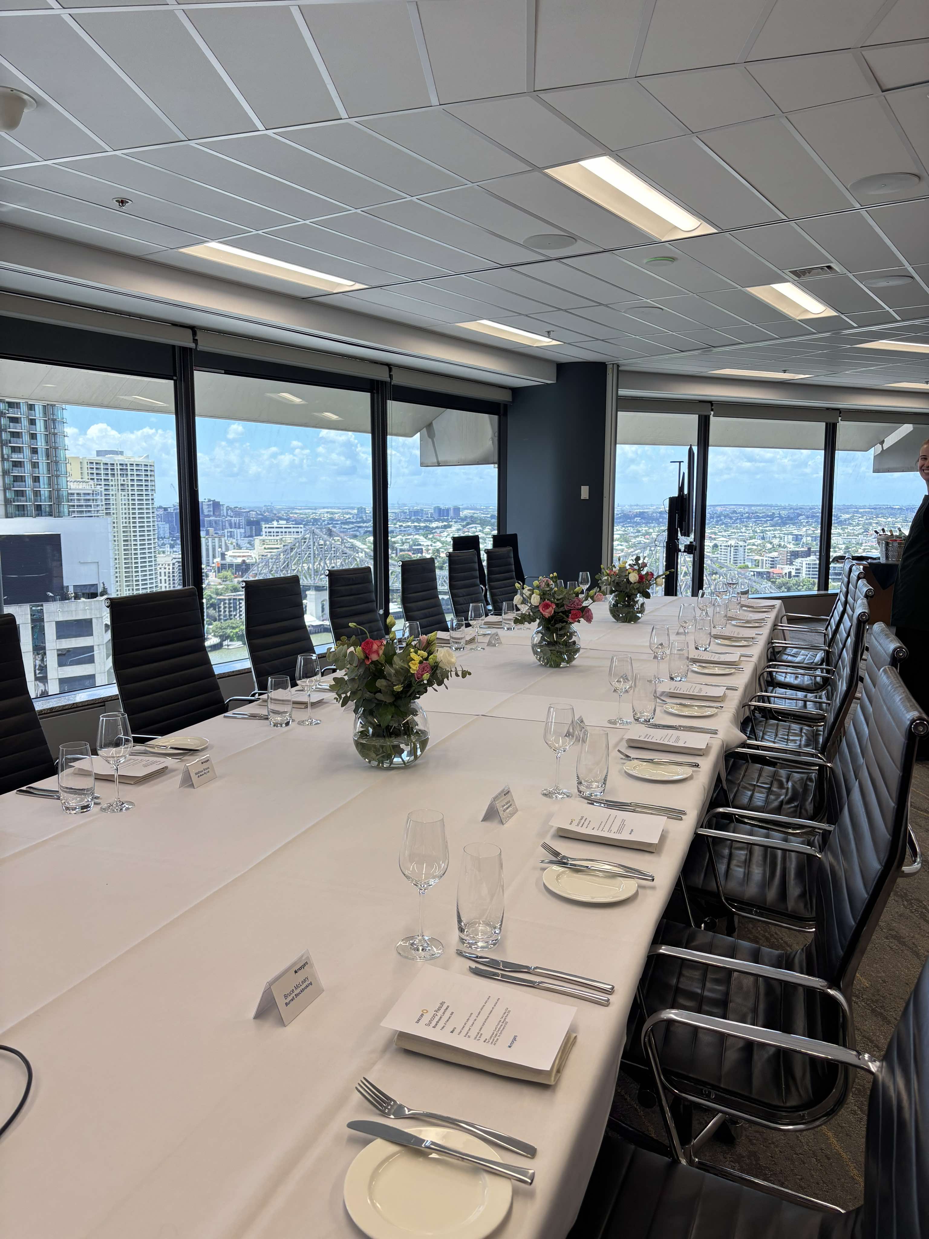 Table Clothed boardroom table ready for a corporate office lunch