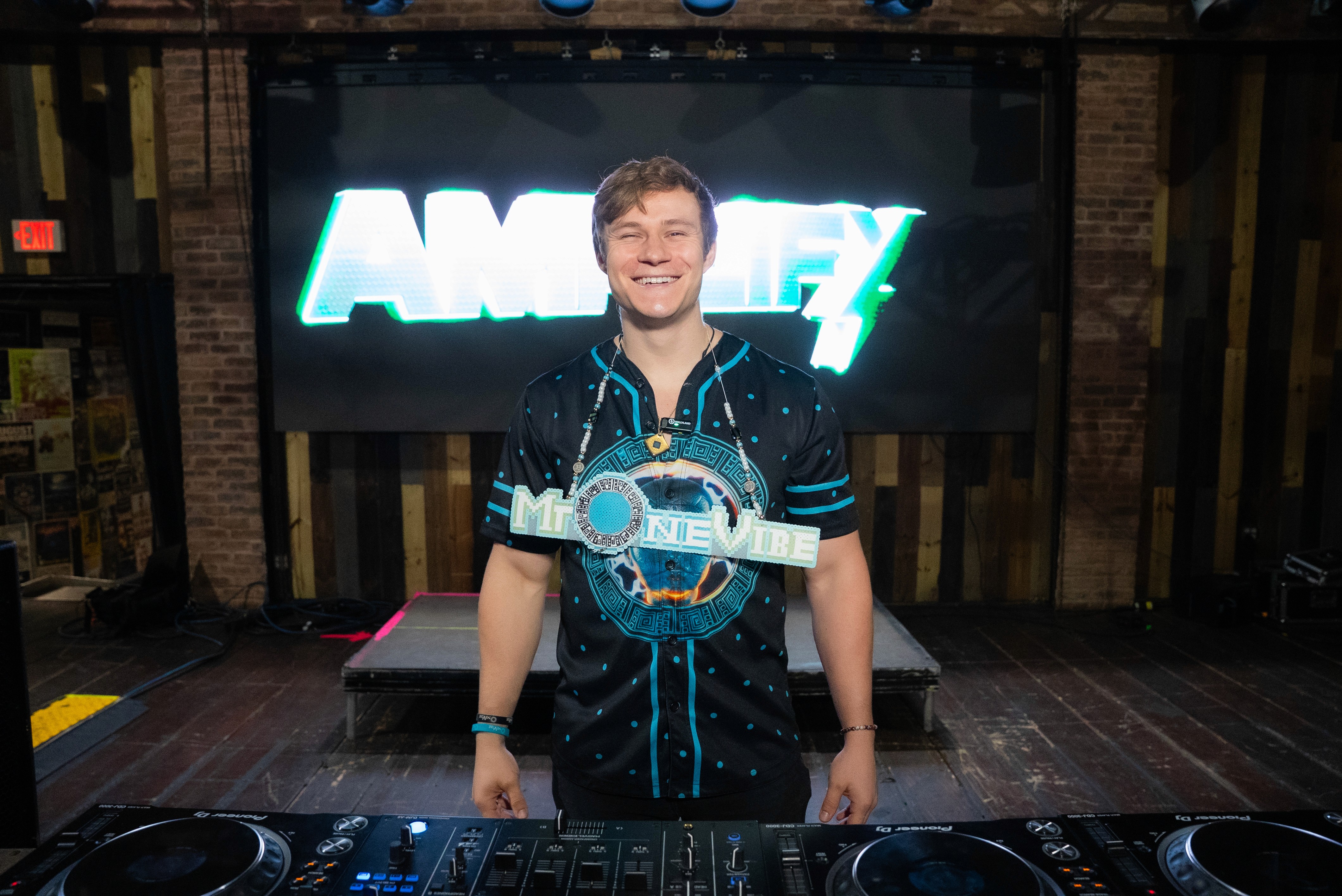 Music producer sitting in his studio