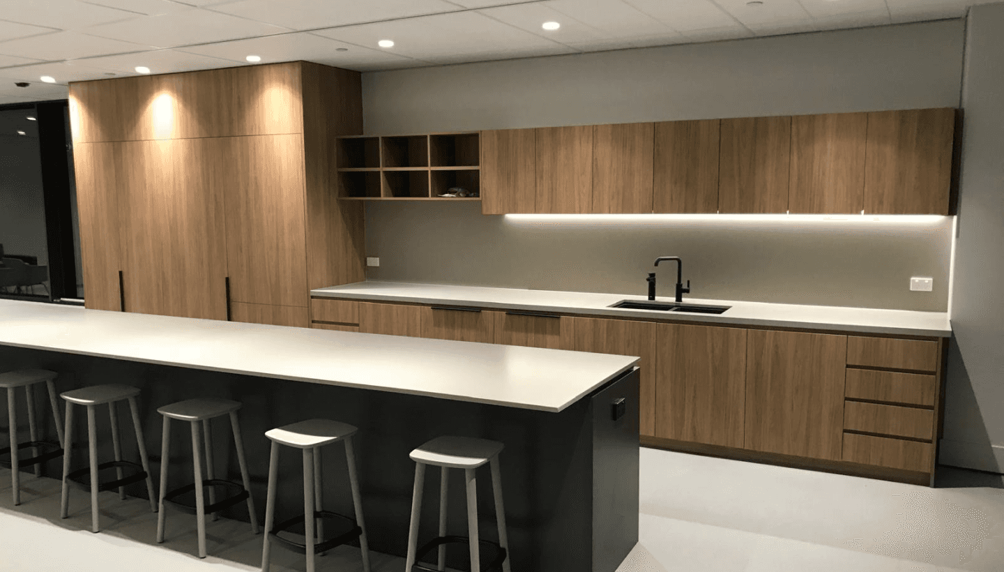 person sitting in a chair in front of a man