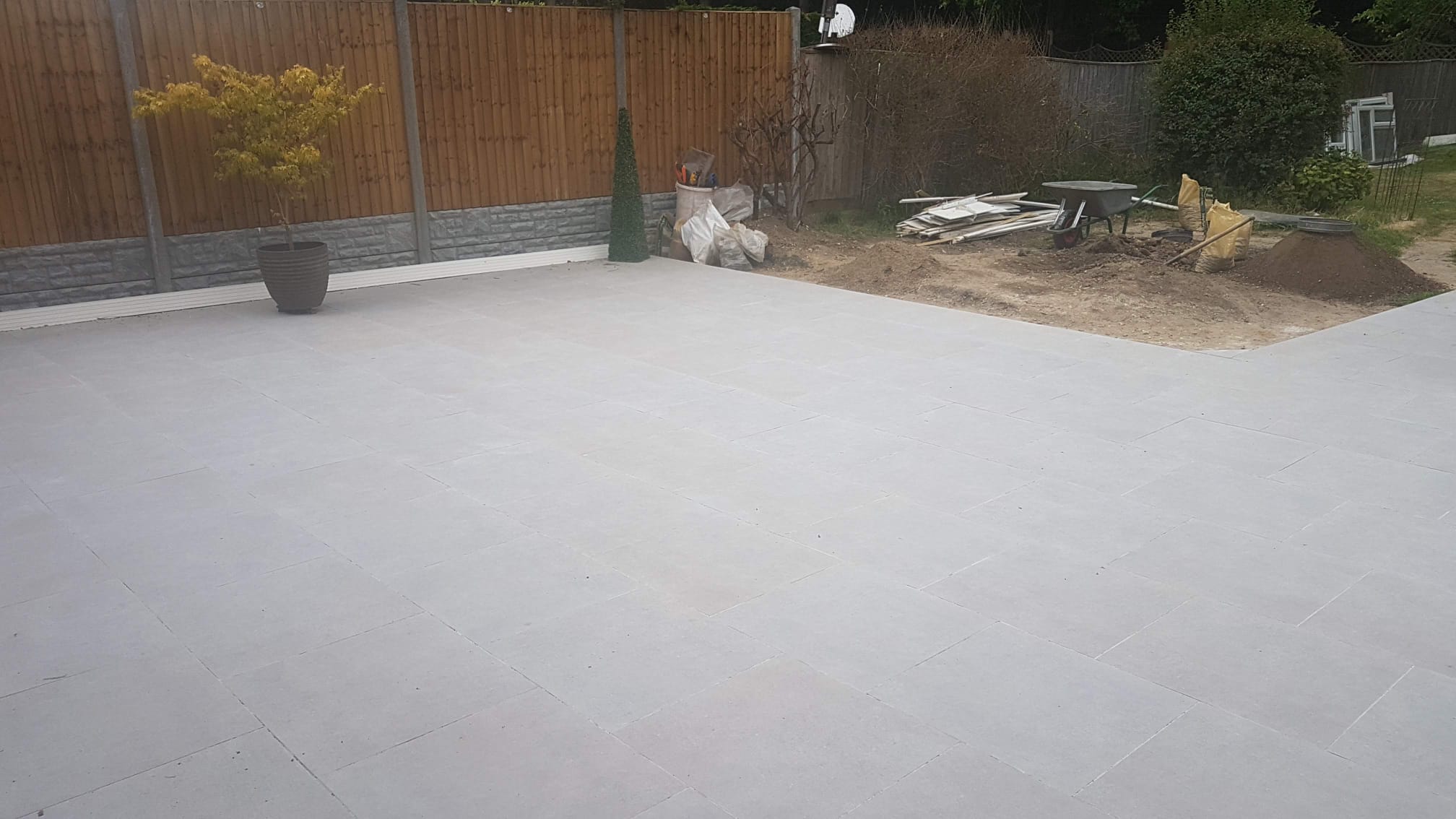 brown wooden ladder on blue plastic container