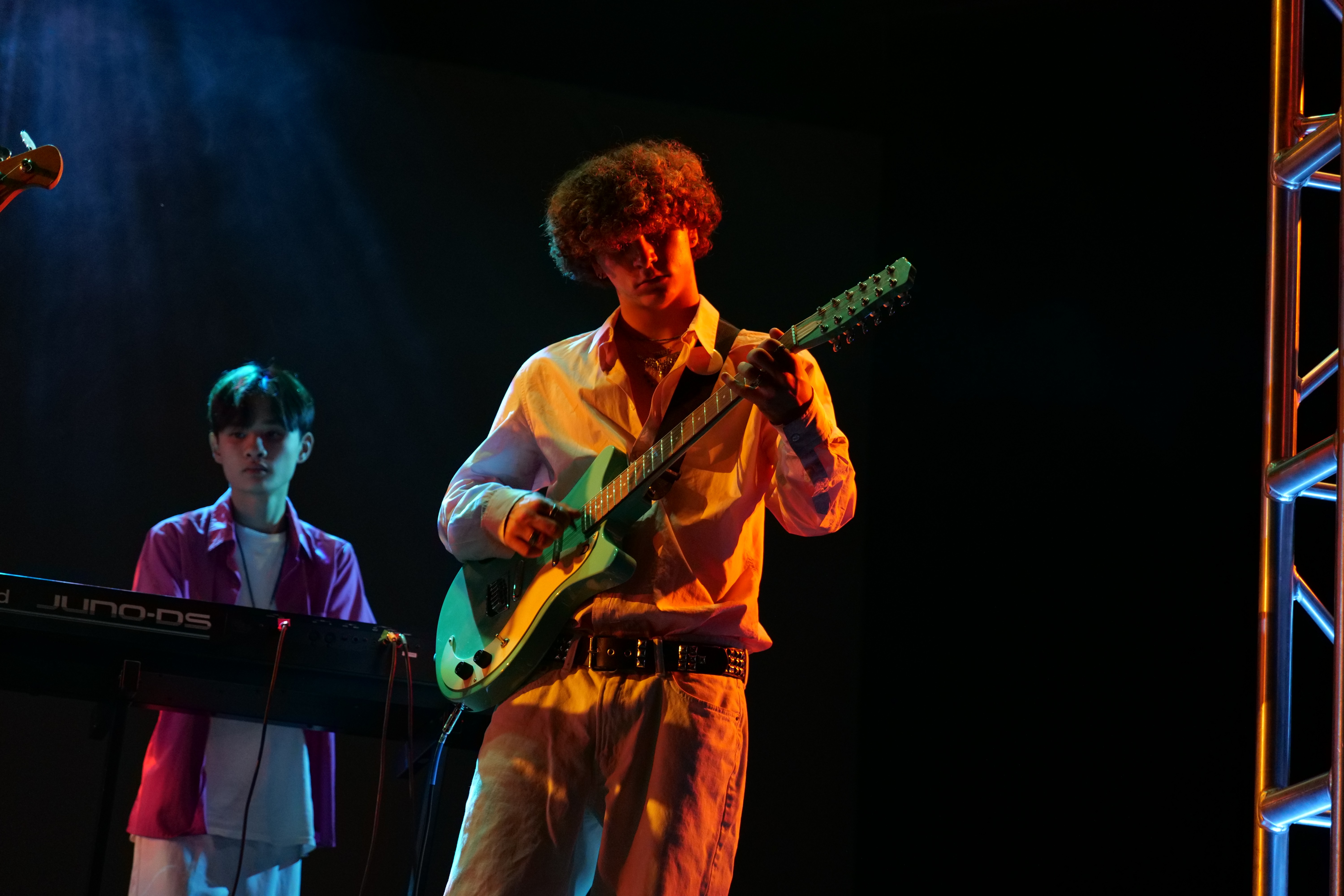 performing playing instrument in moody lighting in Claremont CA| FFotos