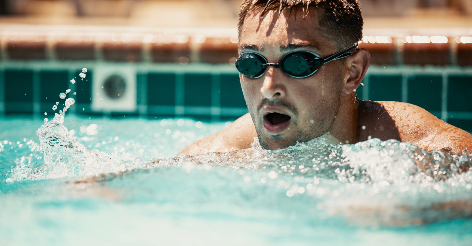 man in pool - Is Swimming Good for Recovery