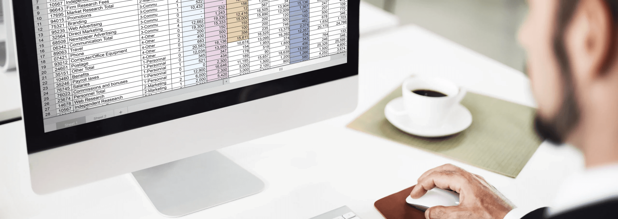 Man working on spreadsheet -  How To Add Apps Script To Google Sheets