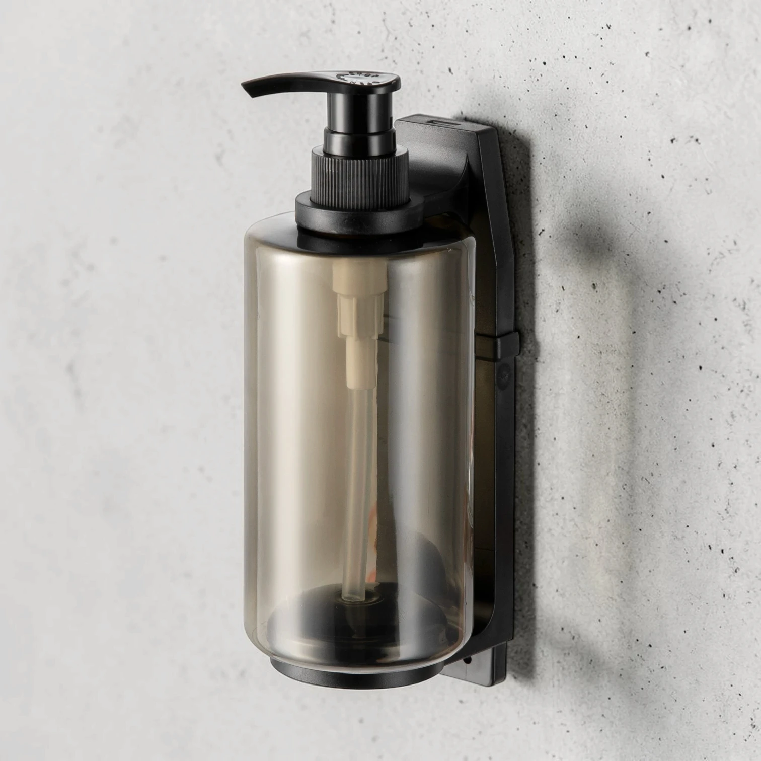 Eco-friendly tamper-proof soap dispenser bracket for hotel refillable systems, high-quality stainless steel, compatible with 300ml-500ml bottles.