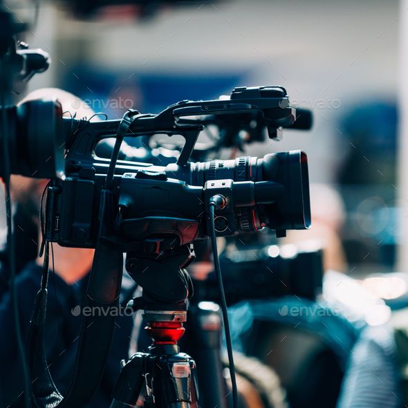camera filming leader
