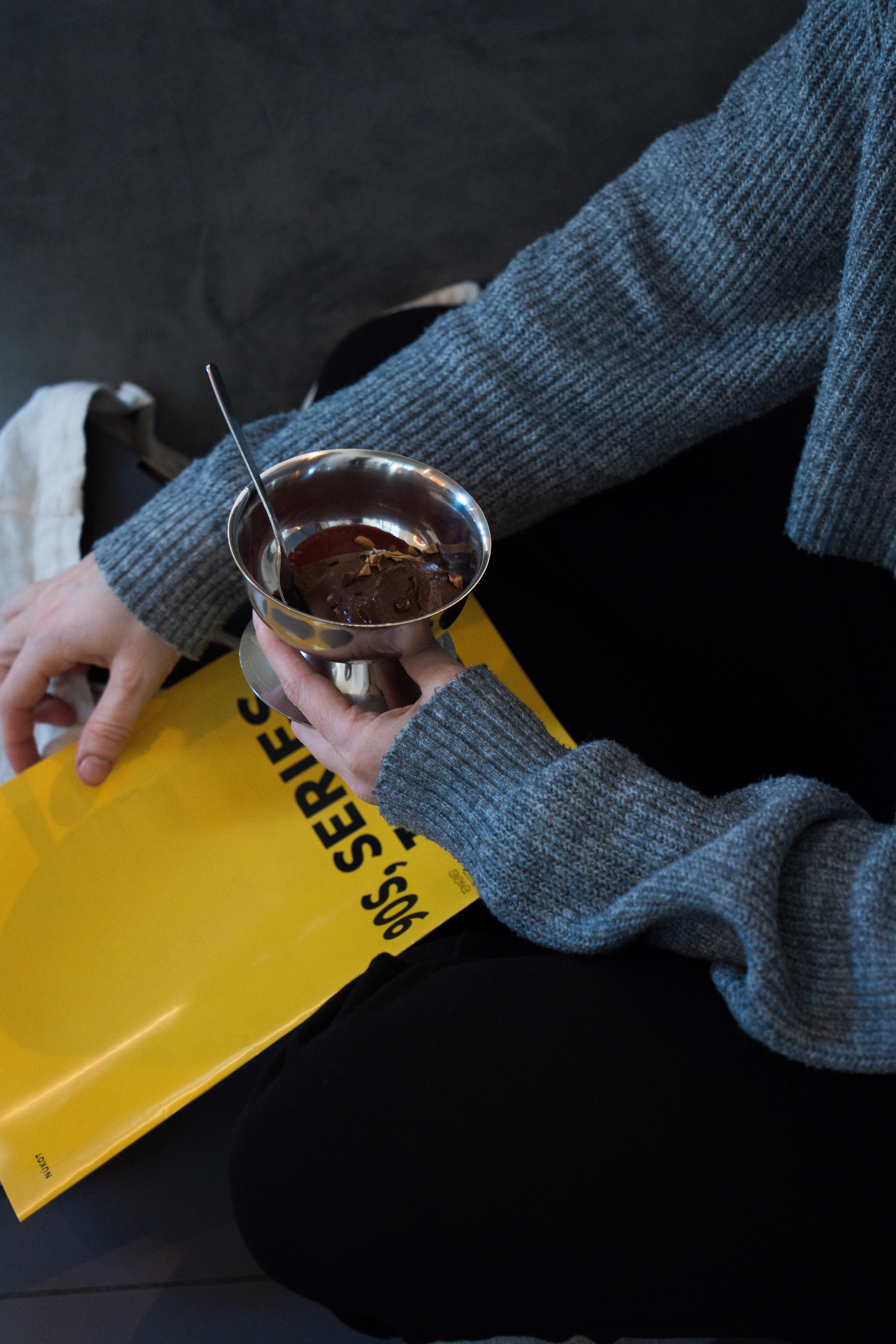 Laying while usGirl using a VR headset while lying on her back.ing VR