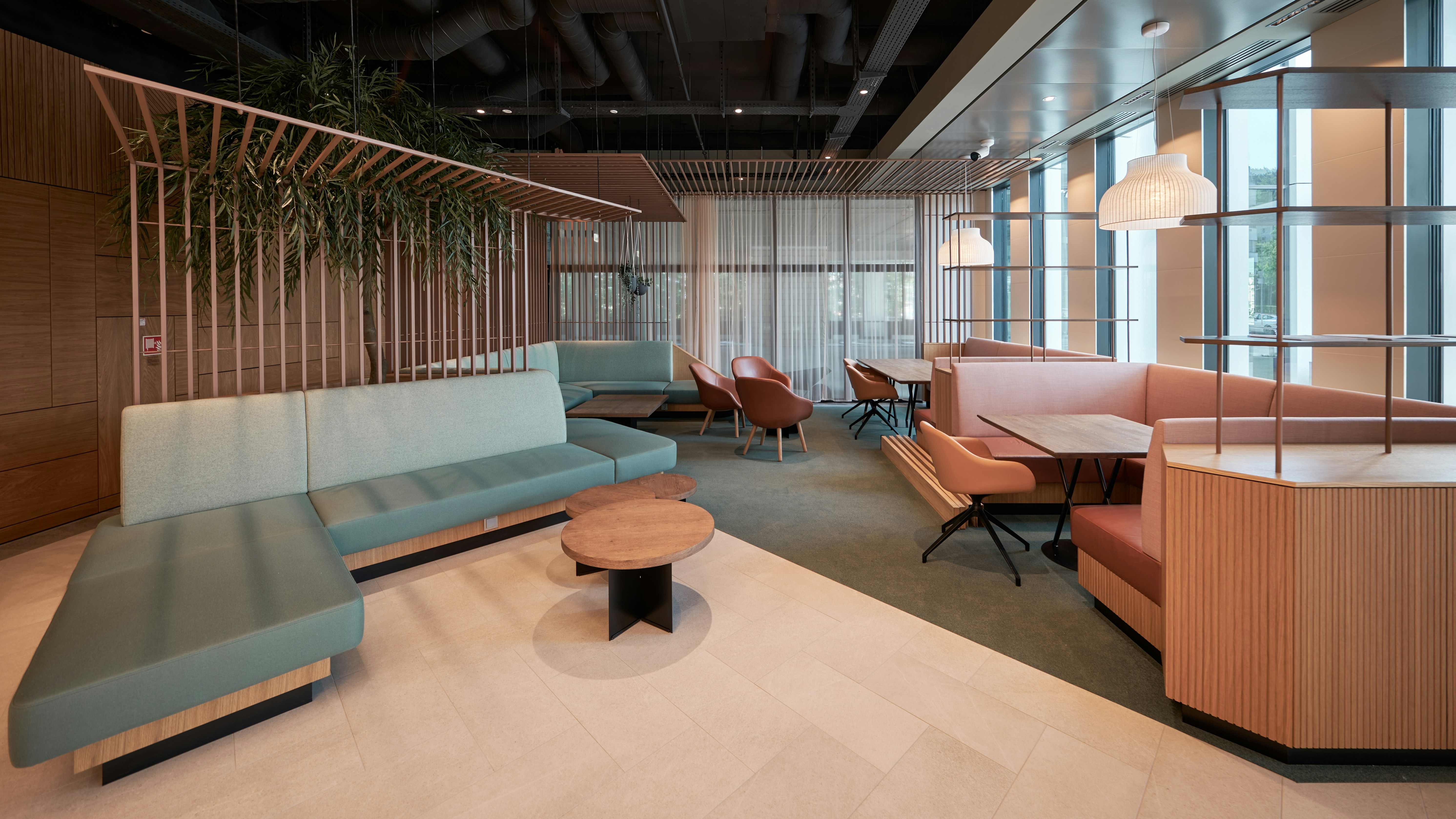 a room with couches and tables