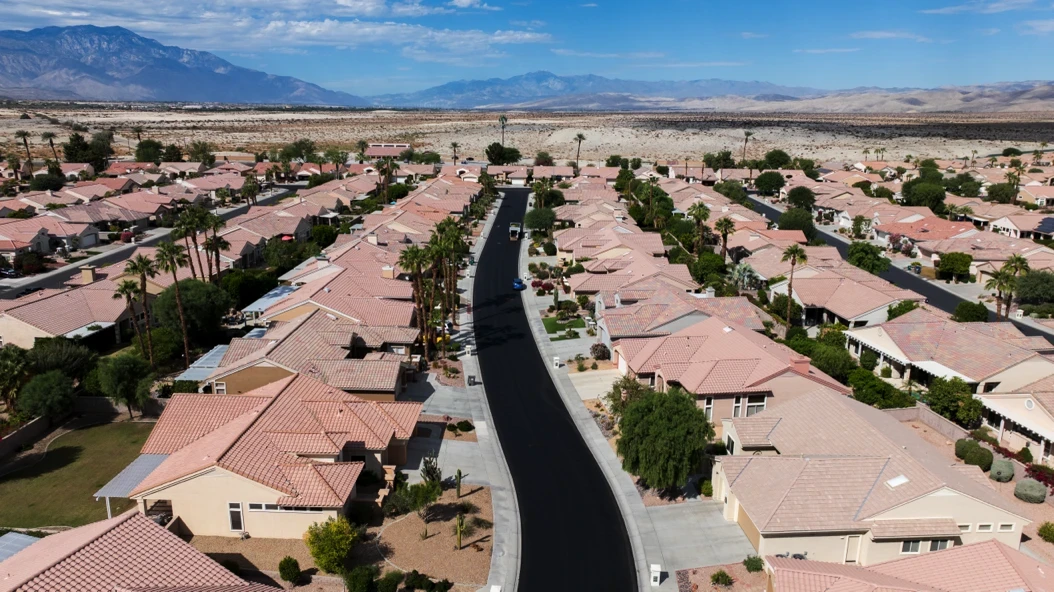 Aerial photo of freshly seal coated HOA private street