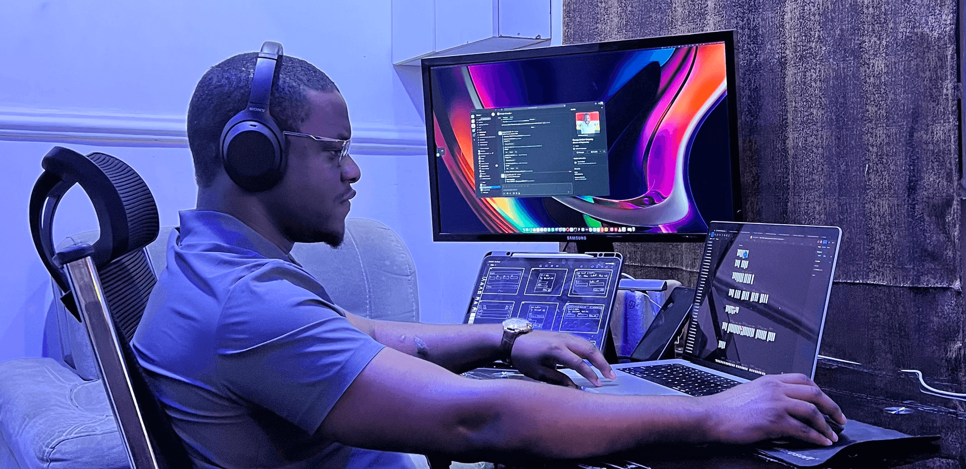 Victor Churchill Workspace showing laptop, monitor, and logitech mouse.