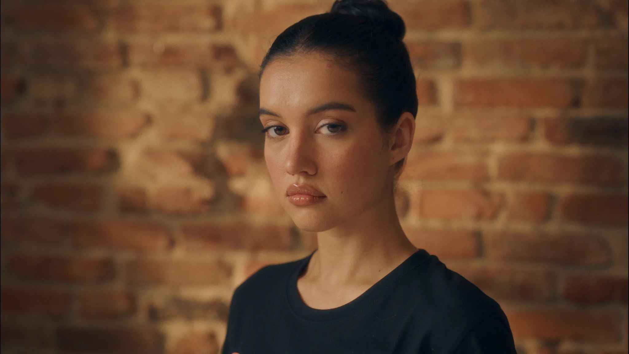 A beautiful girl is walking to the pool