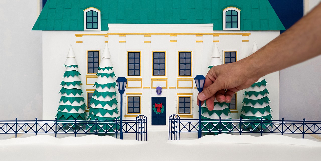 A woman sitting in a photo studio