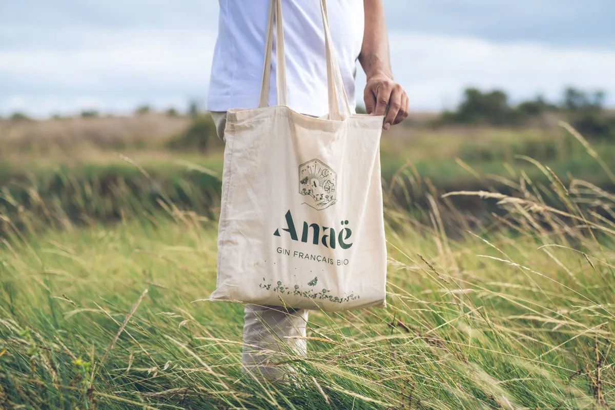 Ecobag personalizada de algodão cru com estampa de evento corporativo