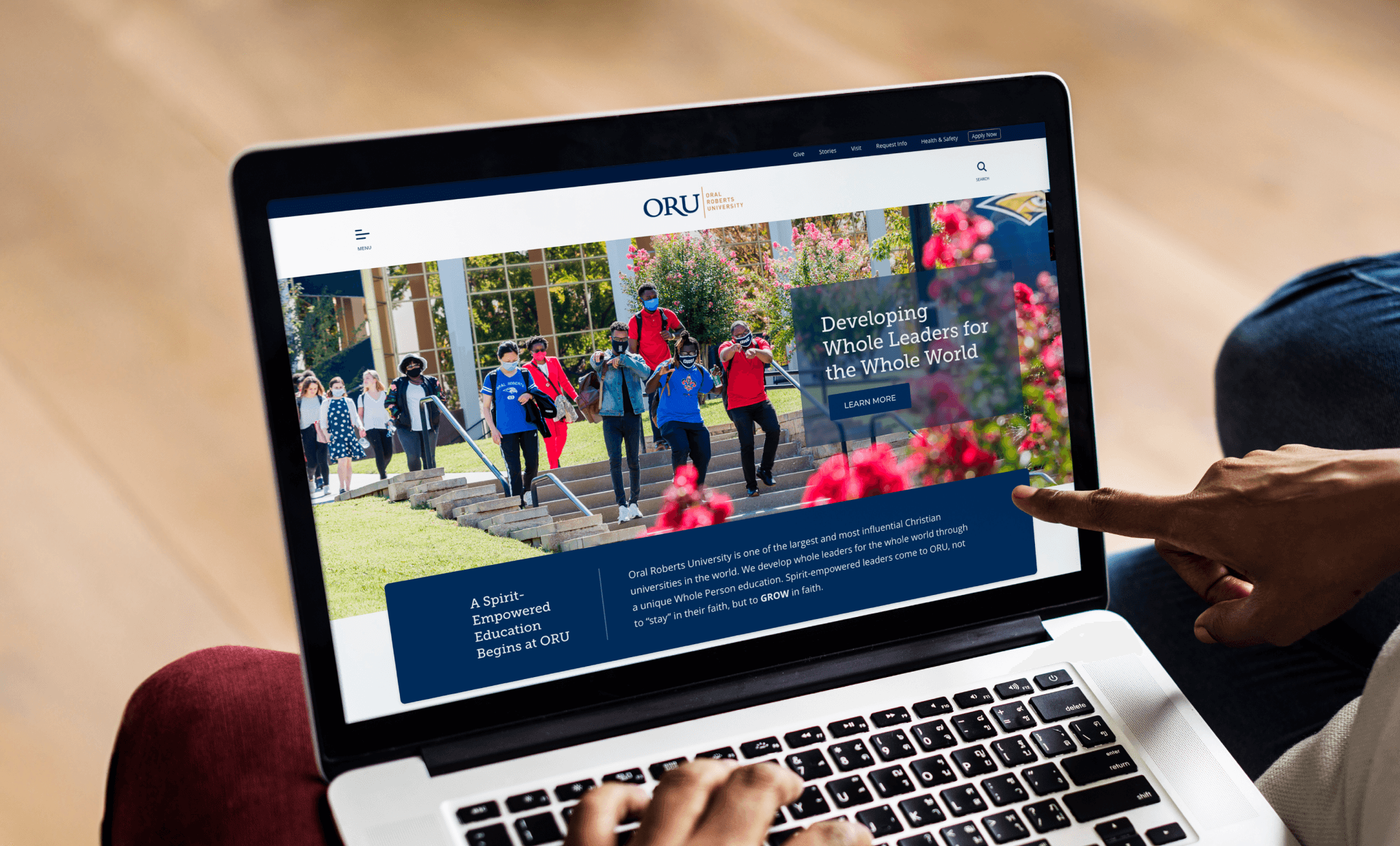 Oral Roberts University webpage on a laptop screen