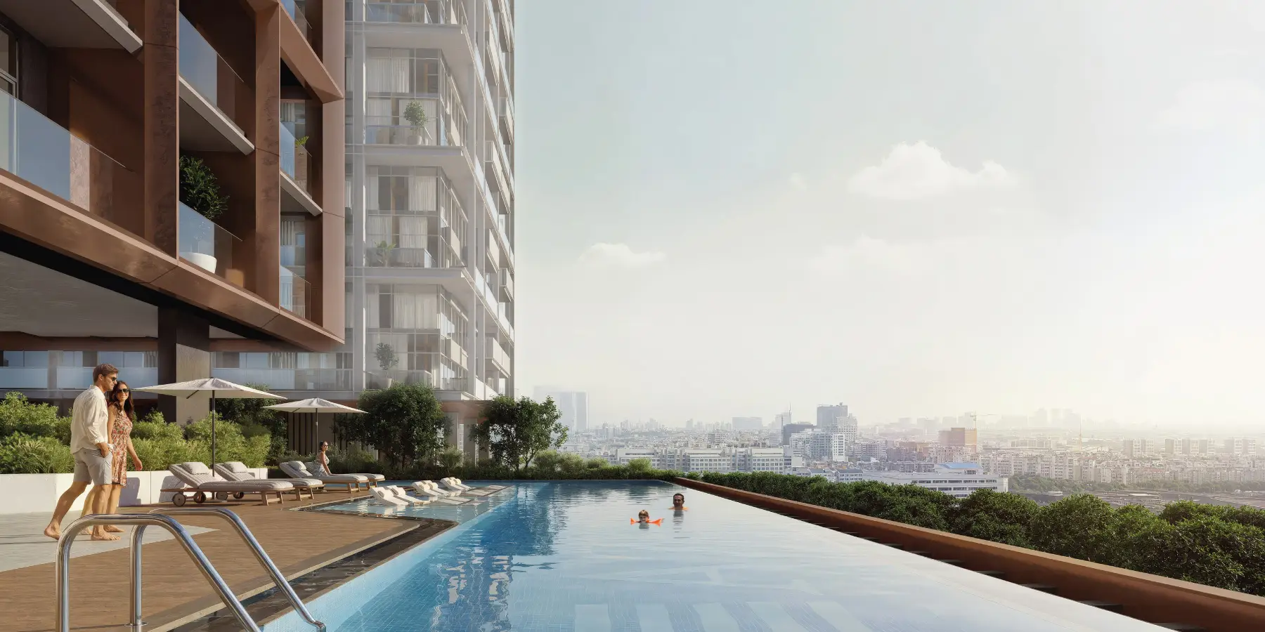 A swimming pool in front of the tall Farishta 2 building, showcasing a modern architectural design.
