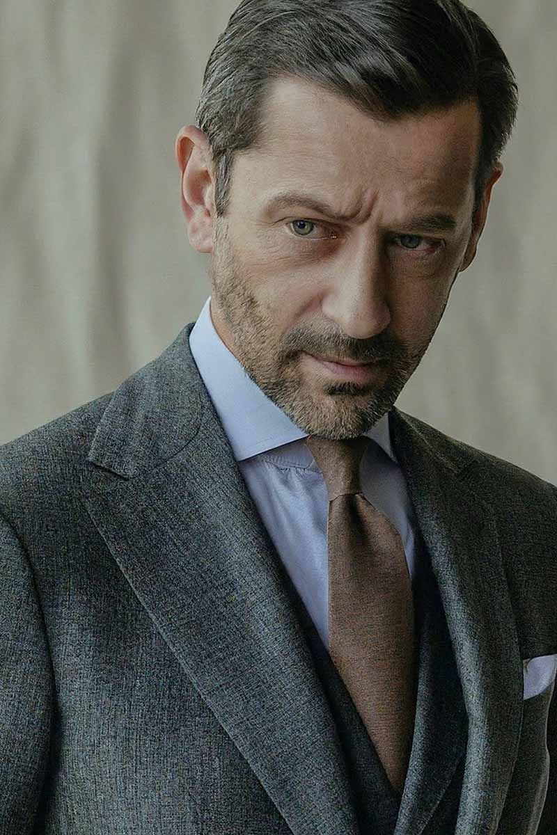 Adam Tackerman, an experienced lawyer, showcasing confidence and expertise in the hero section of the template.