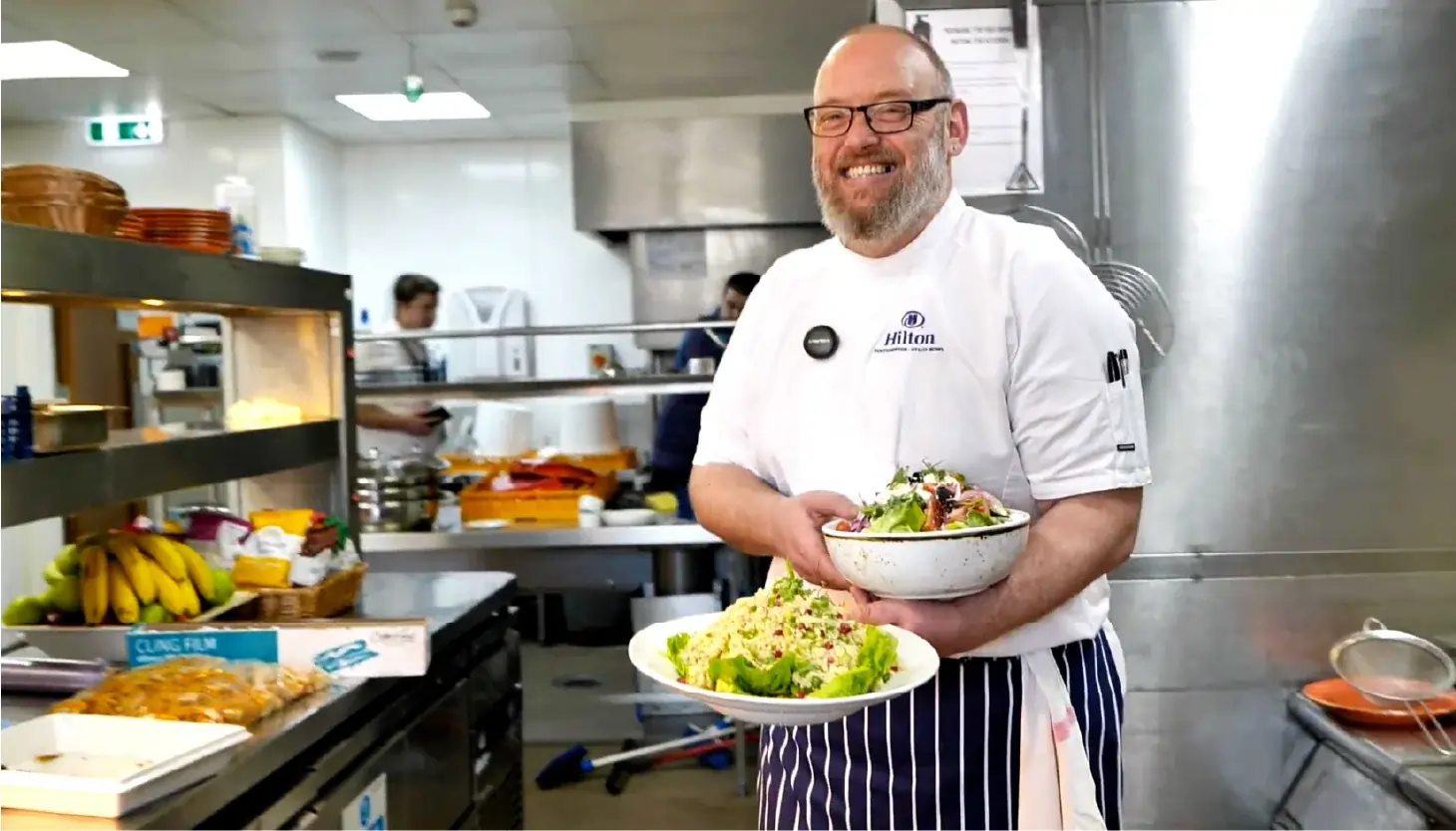 Chef Jamie holding food
