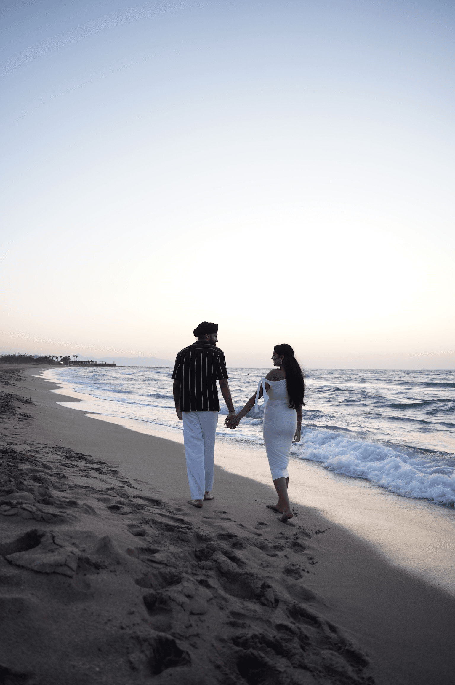 Dog sitting on gravel path