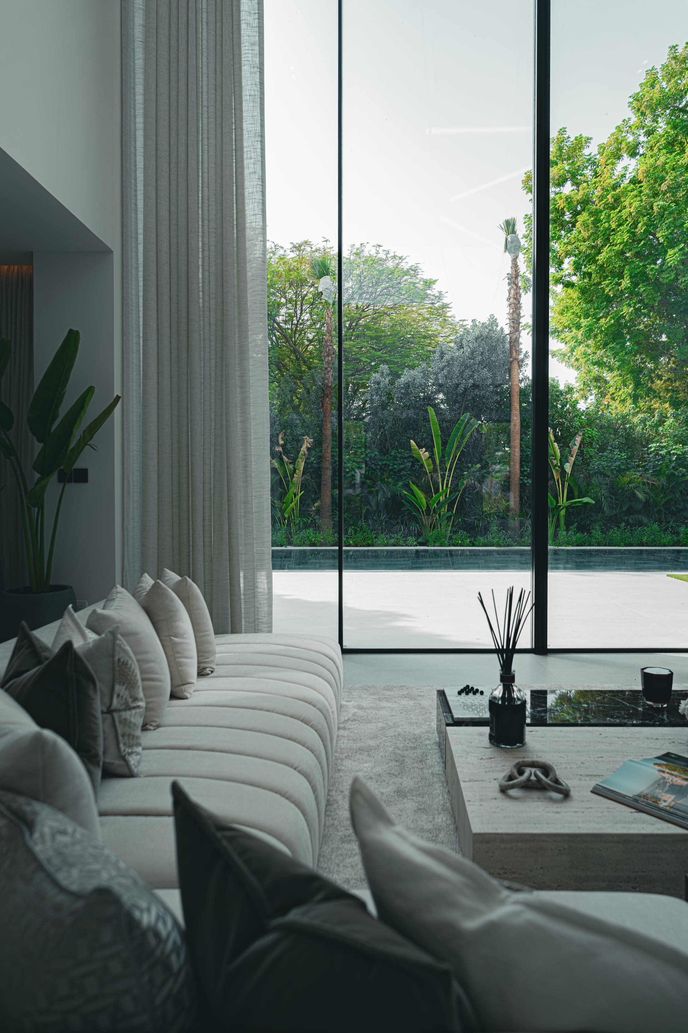 Image of a large villa with big glass windows