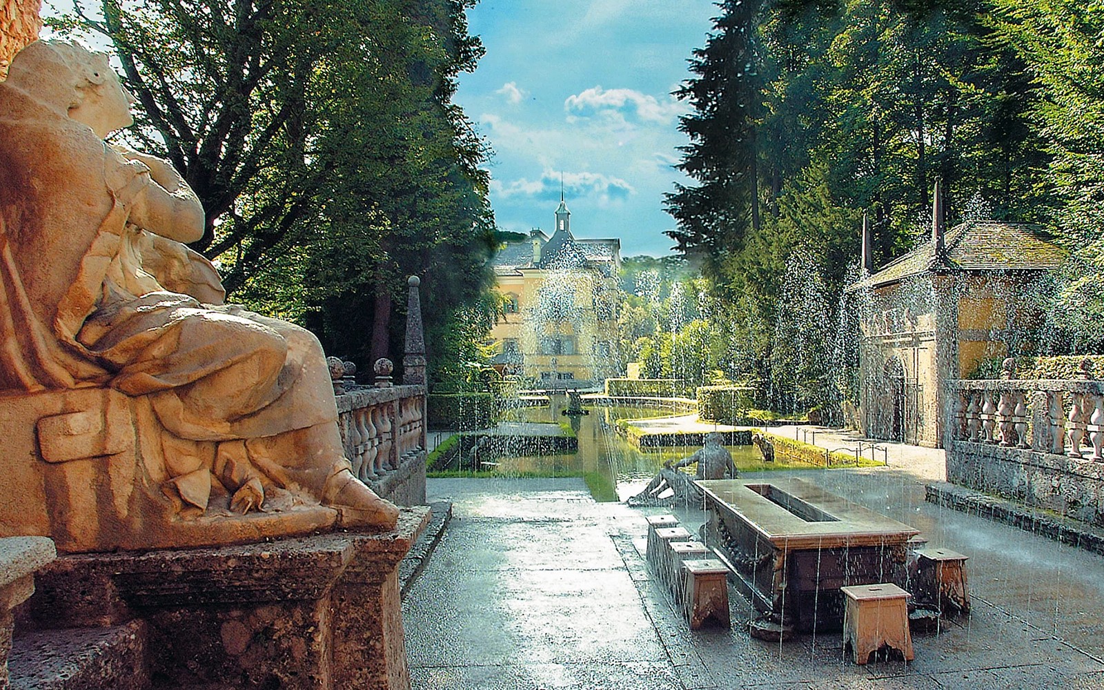 Hellbrunn Palace gardens with fountains in Salzburg, Austria, accessible with Salzburg Card.