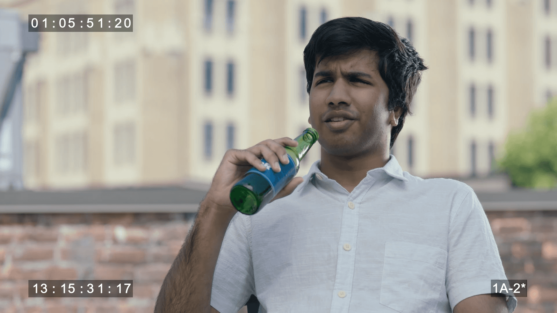 a woman holding a red flower