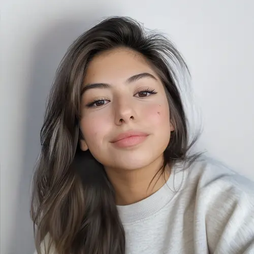 A businessman working on his laptop in an office.