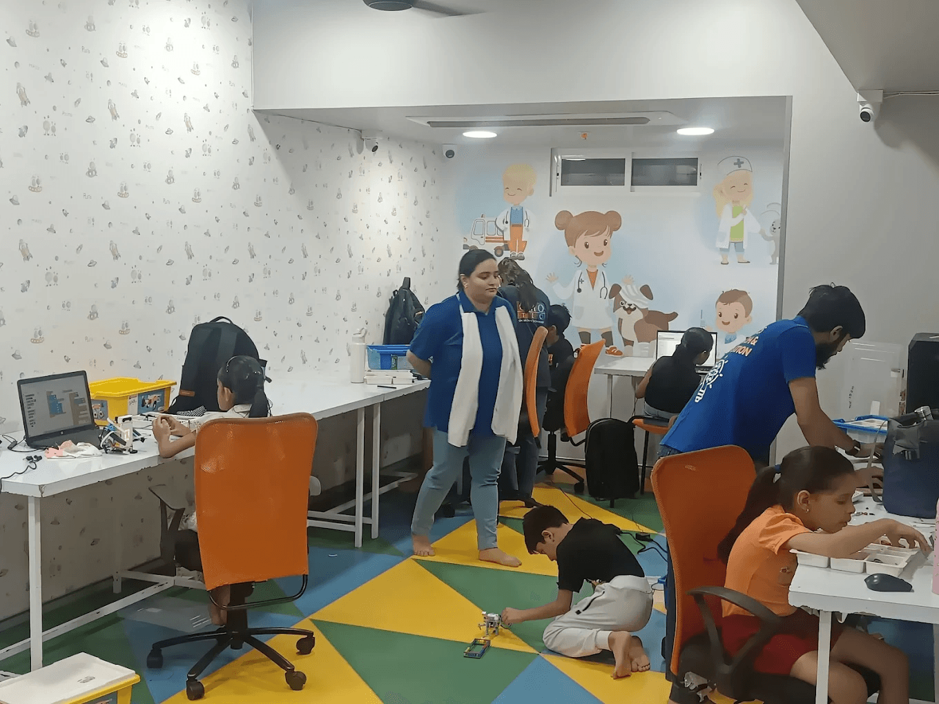 Palm trees frame a dramatic mountain valley landscape